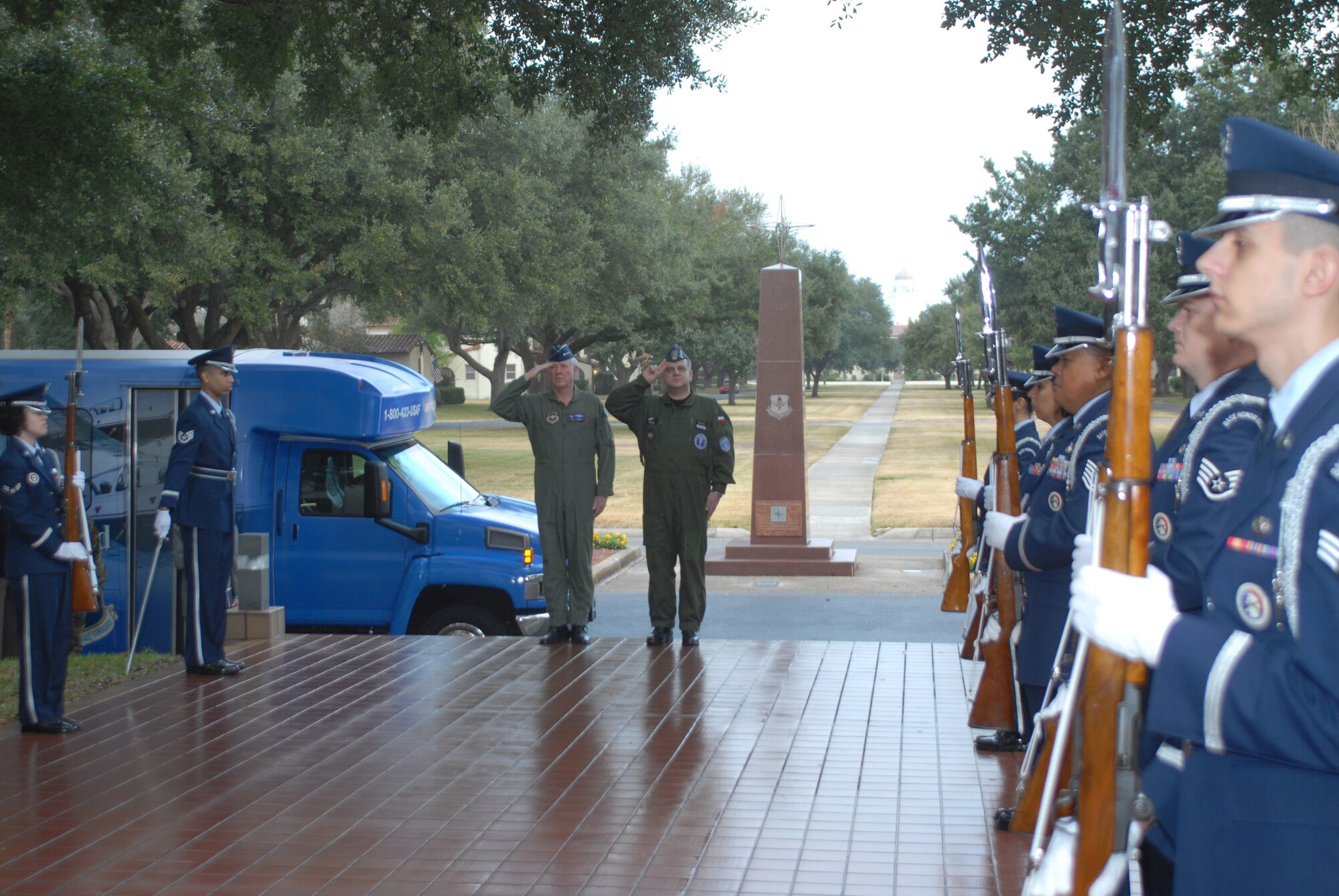 Gen. William R. Looney III, Air Education and Training Command commander, and Lt. Gen. Andrzej Blasik, Polish air force commander, render honors outside of AETC headquarters on Randolph Air Force Base, Texas, as General Blasik arrived Jan. 7, 2008. (U.S. Air Force photo by Rich McFadden)