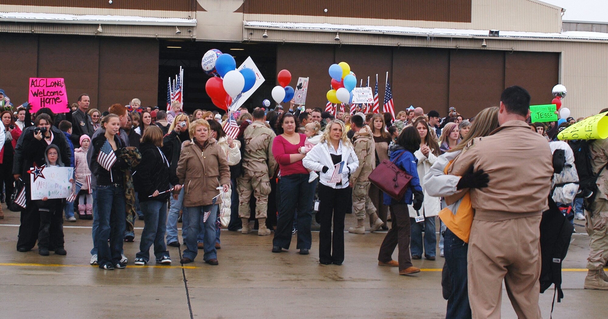 Family and friends gathered on Hill’s flightline Tuesday to welcome several hundred 388th and 419th Fighter Wing Airmen returning from deployment to Balad Air Base, Iraq. The pilots, maintenance, and support personnel were deployed in support of Operation Iraqi Freedom to maintain security and stability in the region by providing close air support for coalition ground troops. Another large group of Airmen from both wings recently deployed to Balad Air Base and will also be charged with flying close air support mission to protect coalition ground forces.  They are due home this spring. 419th FW personnel regularly volunteer to deploy in support of their active duty, 388th FW counterparts now that the wings are associate units as part of the Air Force’s Total Force Integration initiative.  TFI is aimed at increasing combat capability and efficiencies among like units while capitalizing on the high experience levels of Air Force Reserve and Air National Guard personnel.  (U.S. Air Force photo by/Staff Sgt. Kyle Brasier)