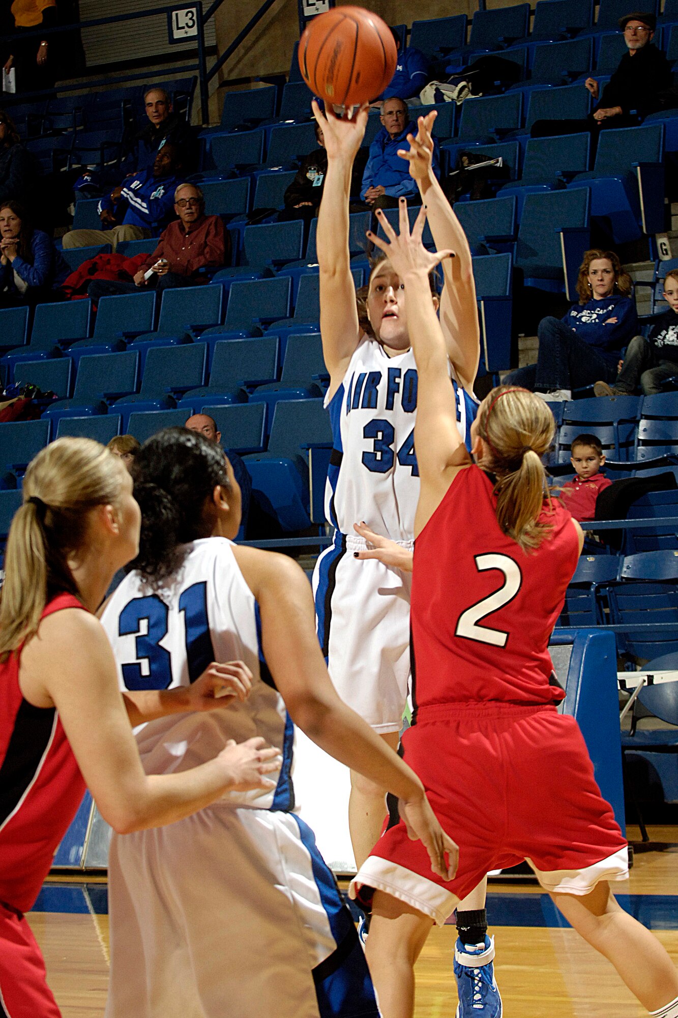 U.S. Air Force Academy Falcon junior guard Brooke Cultra takes a shot during the 60-50 loss against Utah Jan. 9 in Clune Arena at Colorado Springs, Colo. (U.S. Air Force photo/Dave Ahlschwede) 
