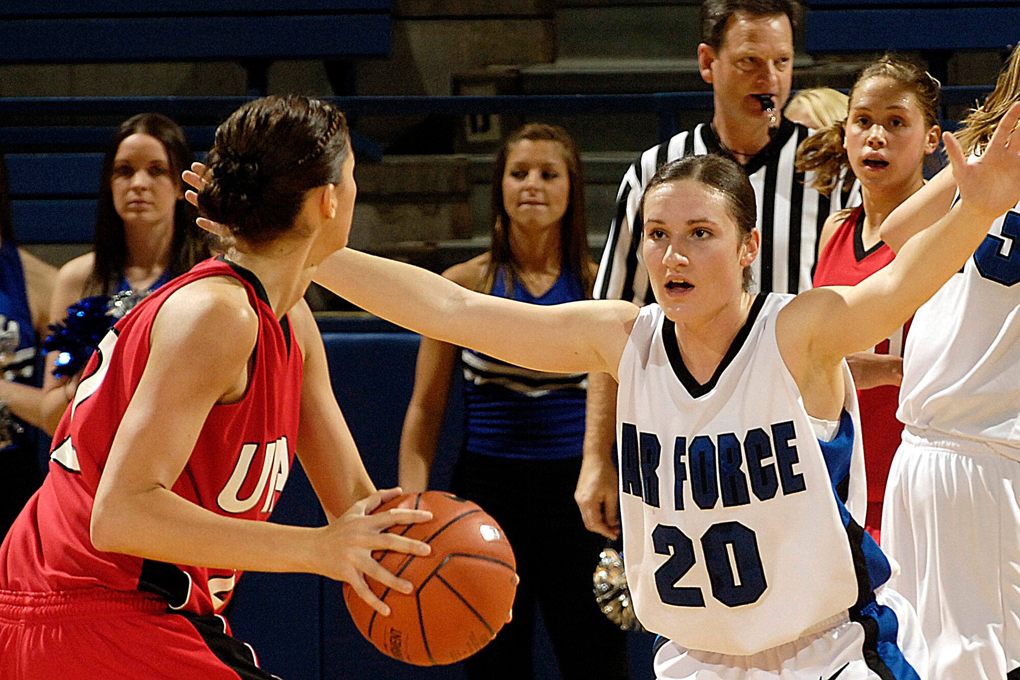 U.S. Air Force Academy Falcon freshman guard Raimee Beck defends the basket during the 60-50 loss against Utah Jan. 9 in Clune Arena at Colorado Springs, Colo. (U.S. Air Force photo/Dave Ahlschwede) 
