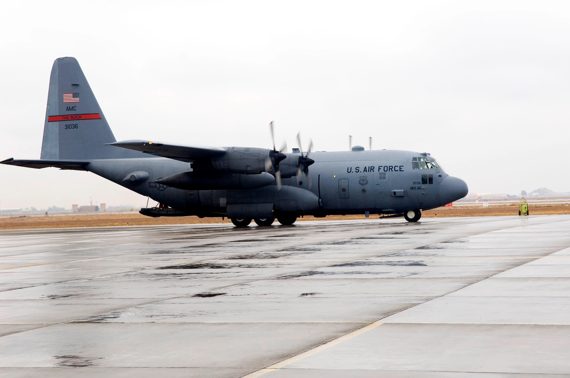 A C-130 Hercules taxies on the runway after the crew picked up military members from a forward operating base in Iraq Jan 11 at a Southwest Asia air base. C-130s assigned to the 332nd Air Expeditionary Wing moved more than 4,500 tons of cargo and 33,500 passengers during this air and space expeditionary rotation. (U.S. Air Force photo/Staff Sgt. Travis Edwards) 
