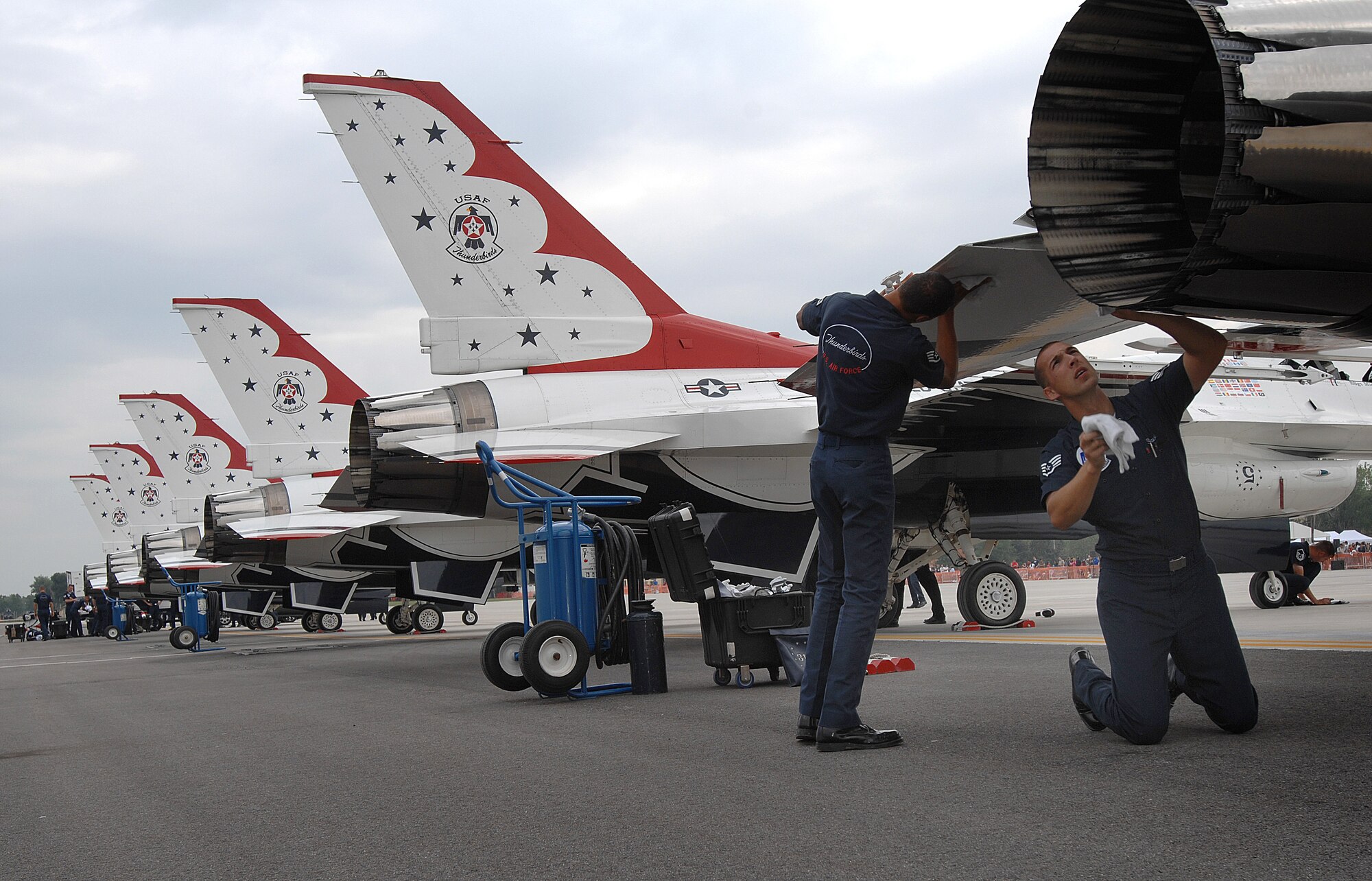 Members of the Air Force Thunderbirds polish down this Thunderbird at Aviano AB, Italy on July 4, 2007.  The Thunderbirds perform for more than 5,000 U.S. Military, family members and Italian Local nationals. This is the Thunderbirds 2007 European Goodwill Tour.  ( U.S. Air Force photo/ Airman First Class Nathan Doza )
