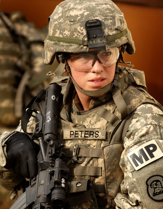 U.S. Army National Guard Sgt. Jennifer Peters stands watch during training on Fort Dix, N.J., Jan. 10, 2008.  She is assigned to the 186th Military Police Company, Iowa Army National Guard, which is scheduled to deploy soon.