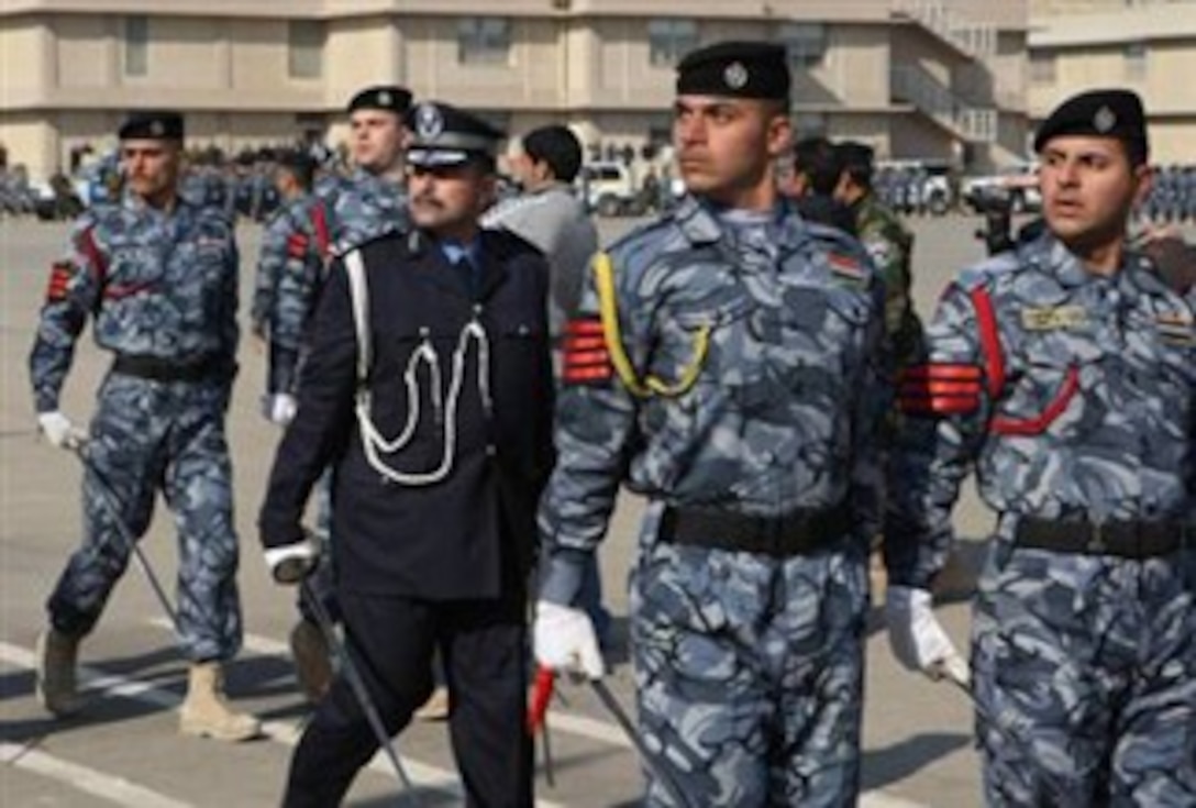 Iraqi Police march during a Police Day ceremony in Baghdad, Jan. 9, 2008, as Iraq’s Interior Ministry highlighted the growing numbers and capabilities of its police forces during its 86th annual Police Day. 