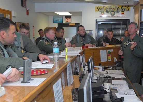 SHAW AIR FORCE BASE, S.C. -- Pilots from the 79th Fighter Squadron are briefed prior to their deployment to the Pacific Air Forces theater of operations Jan. 12. Approximately 300 Airmen and 20 F-16s from Shaw deployed for the operation. (U.S. Air Force photo/Airman 1st Class William Coleman)