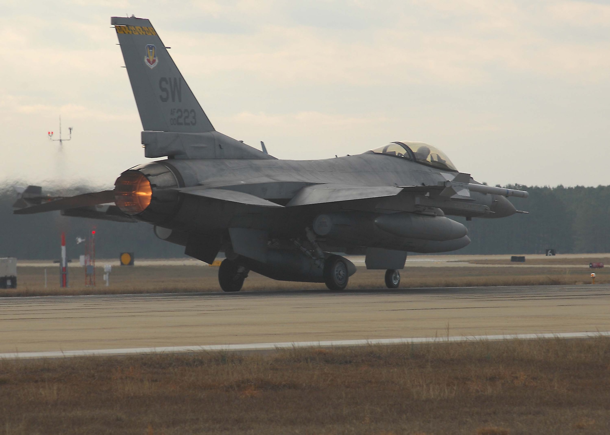 SHAW AIR FORCE BASE, S.C. -- A 79th Fighter Squadron pilot departs Shaw's runway for a deployment to the Pacific Air Forces theater of operations Jan. 12. Approximately 300 Airmen and 20 F-16s from Shaw deployed for the operation. (U.S. Air Force photo/Airman 1st Class William Coleman)