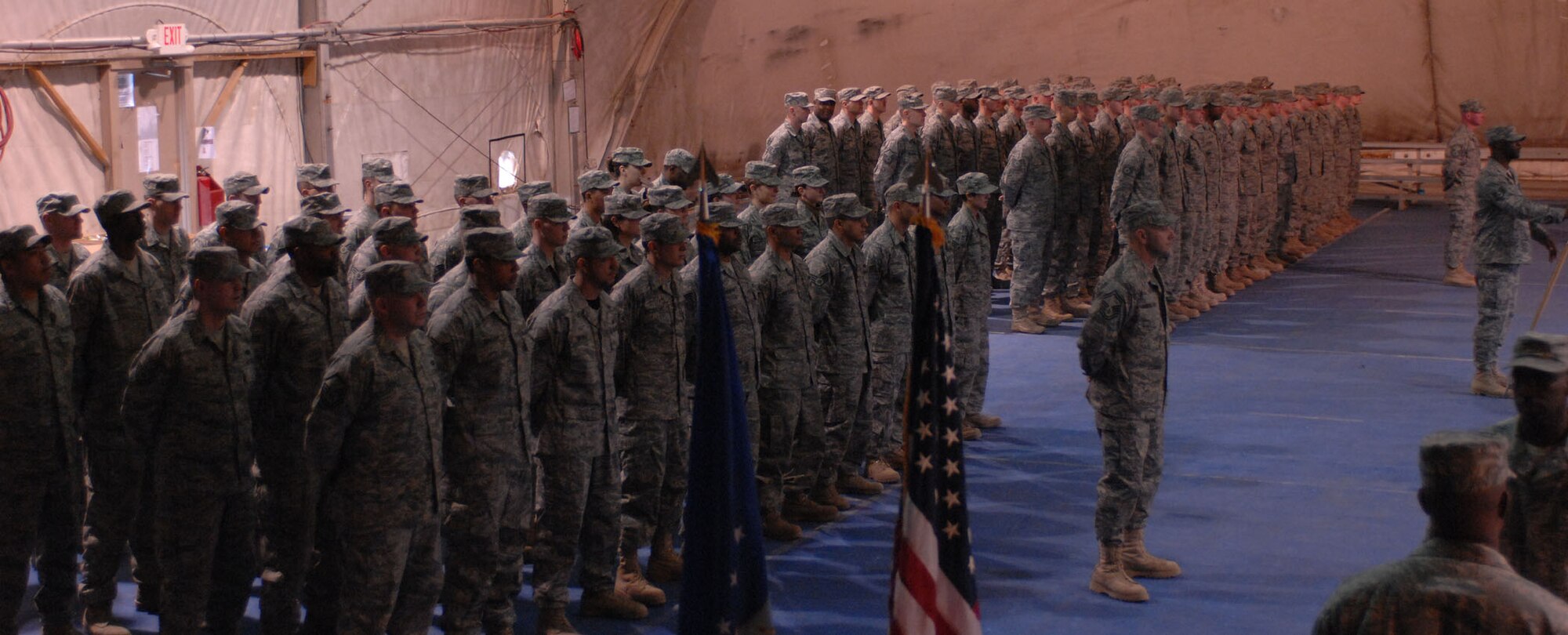 BAGRAM AIR BASE, Afghanistan – Members of the 755th Expeditionary Security Forces Squadron stand together for the last time Jan. 11, 2008.  The squadron, originally formed in December 2005 in response to a U.S. Army request for support of its detainee operations mission, was inactivated during a formal ceremony here today. (U.S. Air Force photo by Staff Sgt. Mike Andriacco)