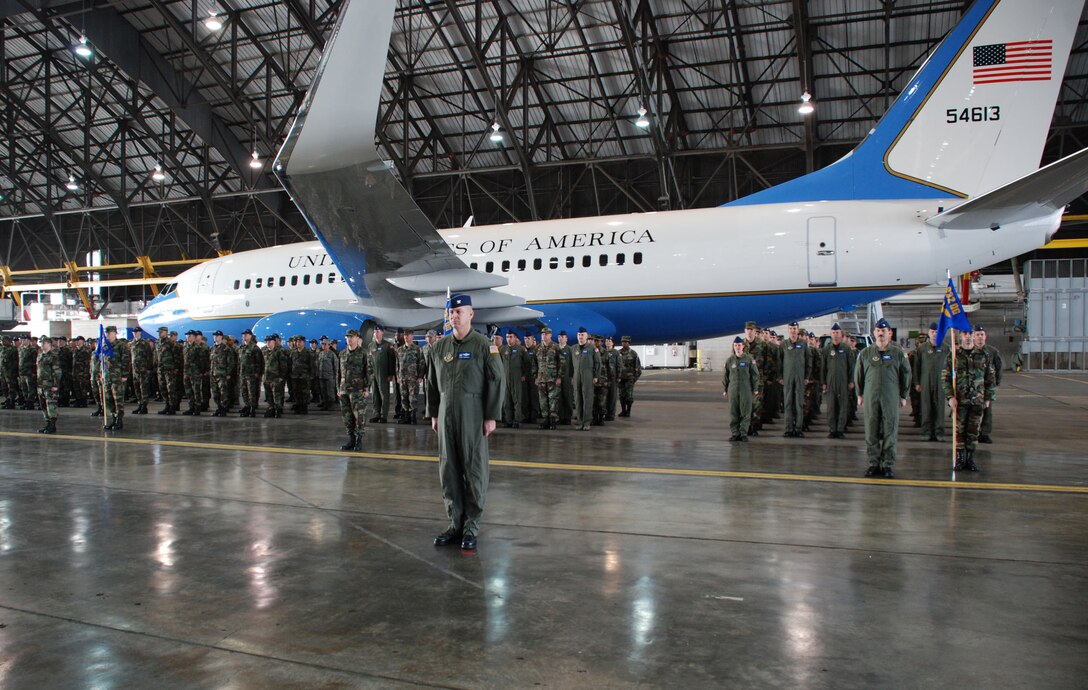 932nd Airlift Wing members stand before a 2007 model C-40C aircraft as they welcome Col. John (Jay) C. Flournoy, Jr. to Illinois.  


He comes in to lead the 932nd from 22nd Air Force at Dobbins Air Reserve Base, Ga., where he served as director of 22nd Air Force Operations. Twenty-Second Air Force is the largest of three numbered air forces in the Air Force Reserve, and manages more than 25,000 reservists. 

The mission of the 1,000 member 932nd AW is to provide first-class, worldwide, safe, and reliable airlift for distinguished visitors and their staffs on the wing's C-9C and C-40 aircraft for VIP special assignment missions. The wing reports to 4th Air Force at March Air Reserve Base, Calif. Officiating at the ceremony was Maj. Gen. Robert E. Duignan, commander of Air Force Reserve Command's 4th Air Force. 

"Maryanne (Colonel Miller) has done a wonderful job with this mission bringing us out of the past and into the future with this airplane," said General Duignan. "This mission is vitally important to this nation. This is a new mission for the reserves, and she jumped in with both feet." 

About Colonel Flournoy, General Duignan said, "He's had a great career. He comes to you at the 932nd as a very experienced aviator and somebody that understands the mission. I know he'll do a great job." 

Colonel Flournoy's arrival at Scott AFB is a homecoming of sorts. His father was assigned to the southern Illinois base three times. 

"When asked where I'm from, I tell people I was born in Alabama, but I consider Scott AFB my home town," said Colonel Flournoy. 

Throughout those assignments, he attended Scott AFB elementary schools and Mascoutah High School in Mascoutah, Ill., for much of his early life. He graduated from Southern Illinois University at Edwardsville, Ill., where he also graduated from the Reserve Officer Training Corps. He entered the Air Force in 1986. 

While on active duty, he served as a B-52 pilot and as a T-37 instructor pilot. He 