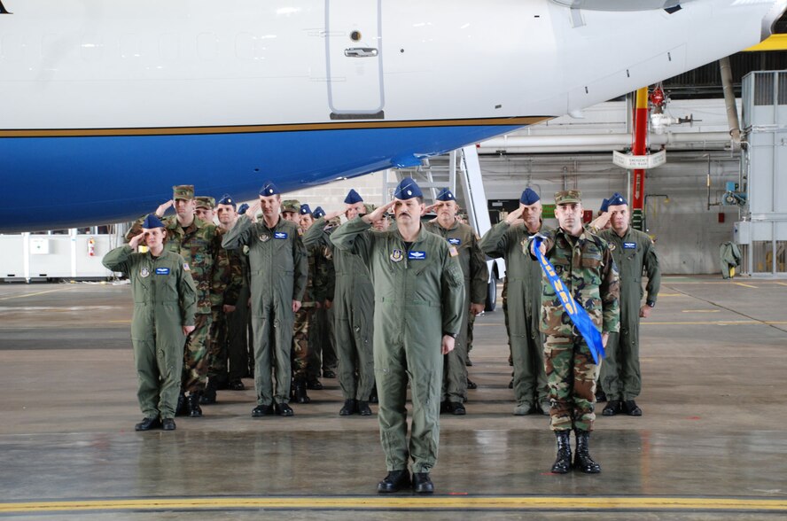 932nd Airlift Wing members salute the American flag during a change of command ceremony for Col. John (Jay) C. Flournoy, Jr. on January 6, 2008.  Photo/Tech Sgt. Gerald Sonnenberg