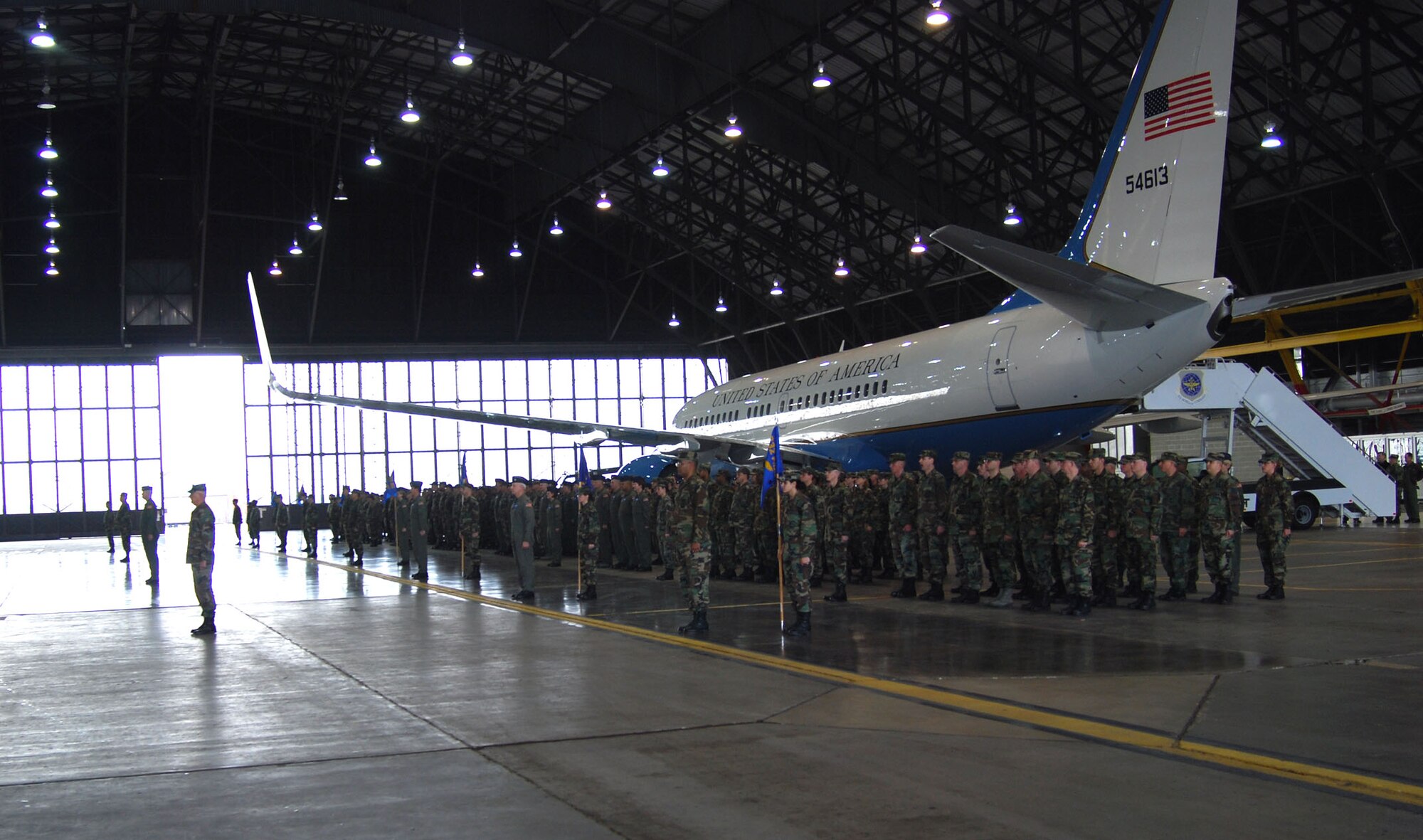 The C-40C winglet of the 932nd Airlift Wing's new aircraft seems to be saluting as a new commander comes aboard.  Col. John (Jay) C. Flournoy, Jr., replaced Col. Maryanne Miller.  Photo/Capt. Stan Paregien