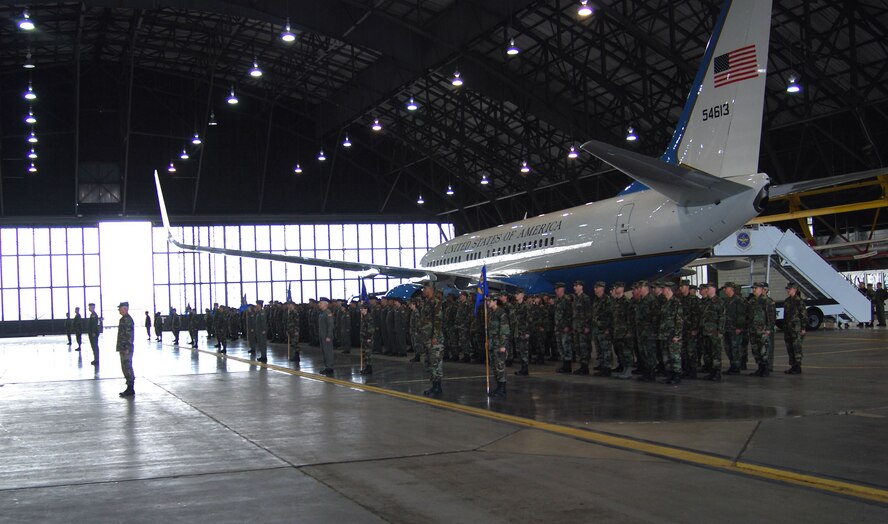 The C-40C winglet of the 932nd Airlift Wing's new aircraft seems to be saluting as a new commander comes aboard.  Col. John (Jay) C. Flournoy, Jr., replaced Col. Maryanne Miller.  Photo/Capt. Stan Paregien