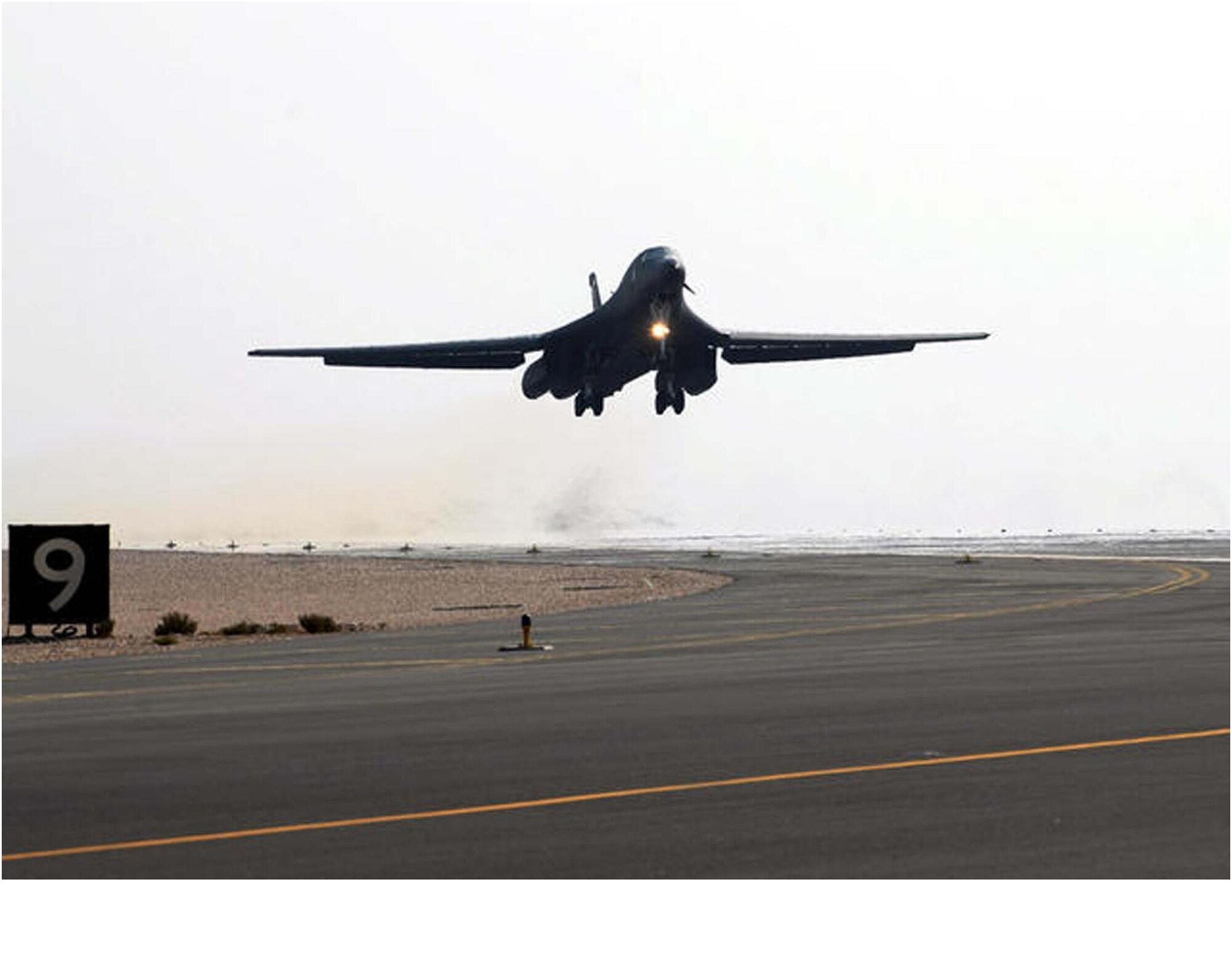An Air Force B-1B Lancer aircraft takes off from the runway of an air base in Southwest Asia, for a mission as part of Operation Enduring Freedom. The B-1B is a multi-role, long-range bomber capable of flying intercontinental missions without refueling. (U.S. Air Force photo by Staff Sgt. Douglas Olsen)