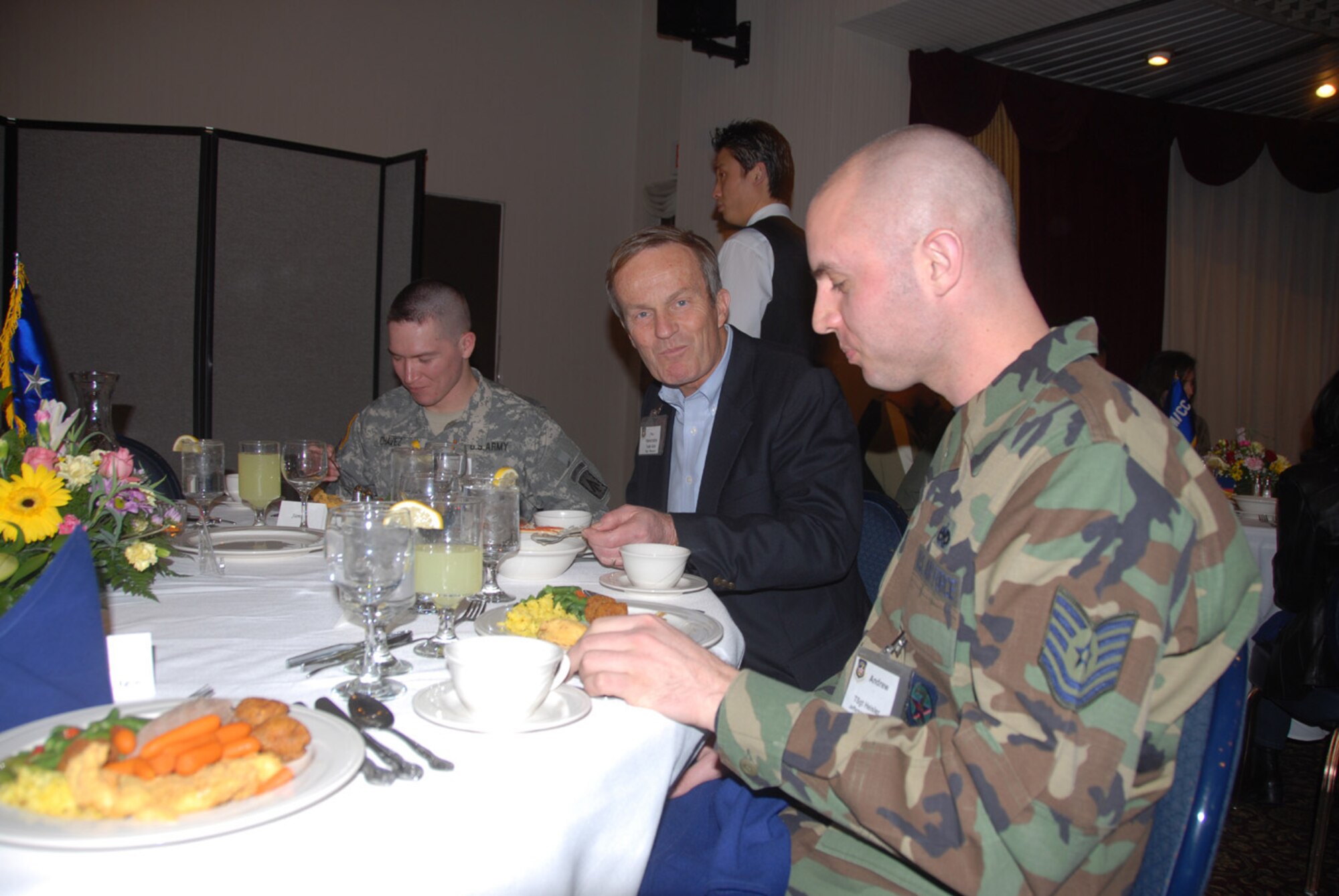 OSAN AIR BASE, Republic of Korea—Rep. Todd Akin (R-MO) speaks with Airmen and Soldiers while eating lunch during a U. S. Congressional delegation visit to Osan Air Base, January 11-12, 2008.  (U.S. Air Force photo by Senior Airman Chad Strohmeyer)