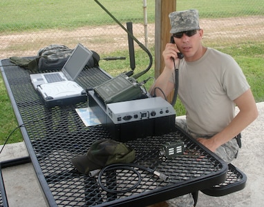 SOTO CANO AIR BASE, Honduras – Army Sgt. Stan Hofferber learns to operate a mobile radio unit as a student of the Joint Task Force-Bravo communications directorate telecom academy.  Enlisted Soldiers and Airmen are randomly selected to attend the training, which was designed to extend commanders’ options when it comes to deploying capable communications specialists.  (Contributed photo)