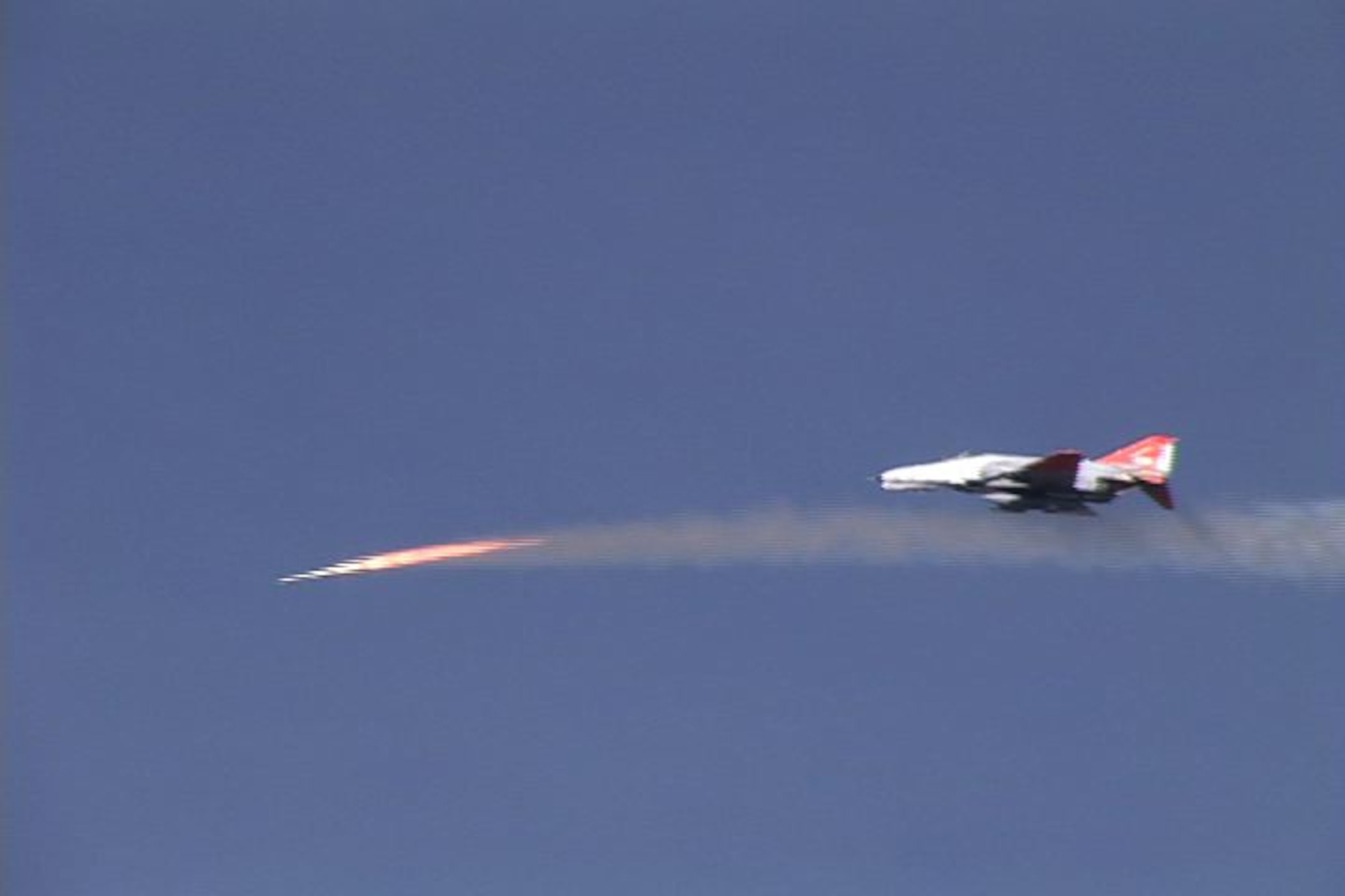 The QF-4 drone launchs a missile over White Sands Missile Range, N.M. on Jan. 09, 2008. This was the first air to ground missile fired off the unmanned drone. (U.S. Air Force photo courtesy of Det 1, 82 Aerial Targets Squadron)