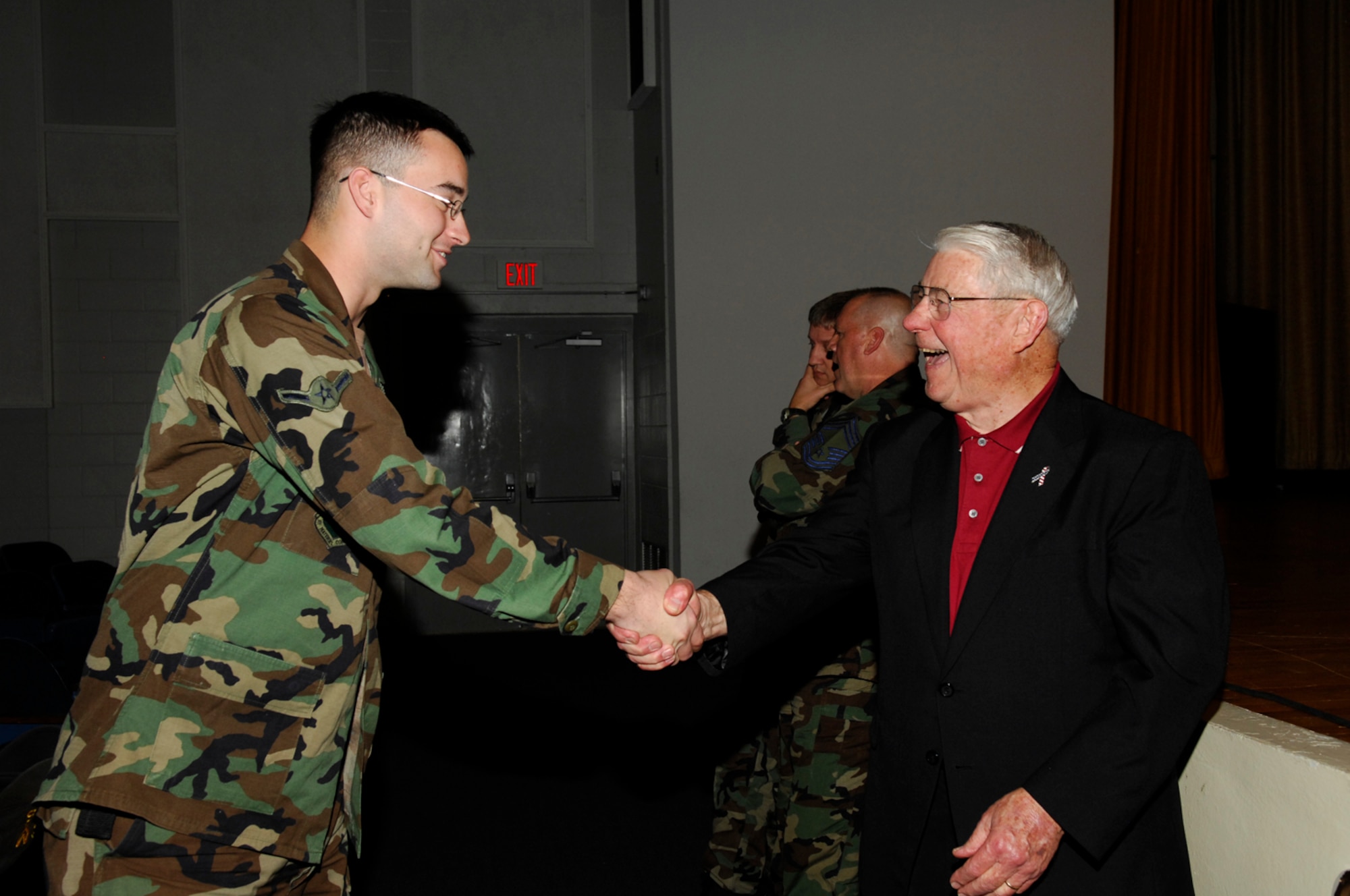 EGLIN AIR FORCE BASE, Fla. -- Retired Chief Master Sgt. of the Air Force Robert Gaylor, the fifth to hold the highest enlisted rank, speaks with Airman Andrew Chapman, 46th Maintenance Squadron, after the enlisted call Jan. 11 at the base theater.