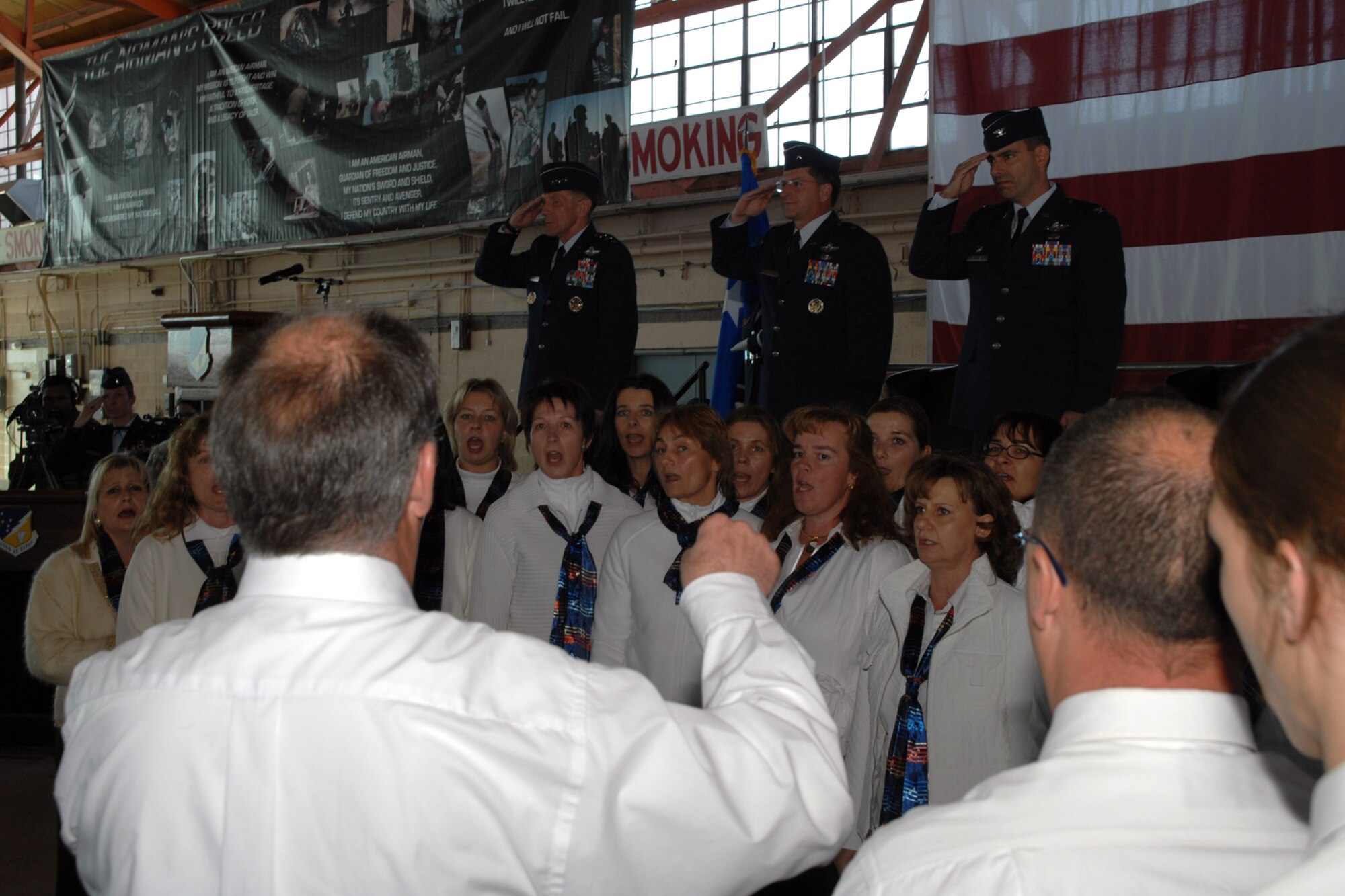 The German Choir sings the National Anthem during the 49th Fighter Wing change of command ceremony Jan. 11, 2008, at Holloman Air Force Base, N.M. Relinquishing command of 49 FW was Brig. Gen. David Goldfein and assuming command was Col. Jeffrey Harrigian. The presiding officer for the ceremony was Lt. Gen. Norman Seip, 12th Air Force commander. (U.S. Air Force photo/Airman 1st Class Jamal D. Sutter)