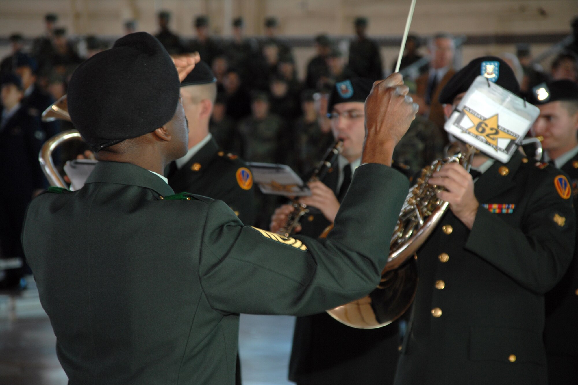 The Fort Bliss Band performs the Air Force Song, ending the 49th Fighter Wing change of command ceremony Jan. 11, 2008, at Holloman Air Force Base, N.M. The ceremony was attended by members of Team Holloman and visitors from Alamogordo, White Sands and Las Cruces, N.M., and Fort Bliss, Texas. (U.S. Air Force photo/Airman 1st Class Jamal D. Sutter)