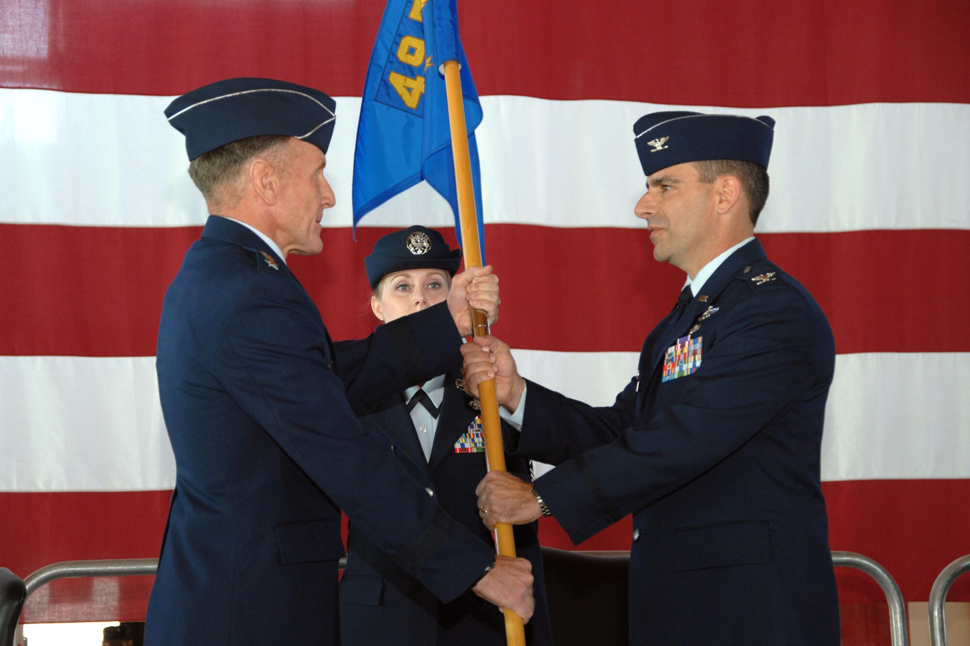 Col. Jeffrey Harrigian accepts the guidon from Lt. Gen. Norman Seip, 12th Air Force commander, and assumes command of the 49th Fighter Wing during a change of command ceremony Jan. 11, 2008, at Holloman Air Force Base, N.M. Colonel Harrigian is coming from Langley Air Force Base, Va., where he served as the vice commander of the 1st Fighter Wing. (U.S. Air Force photo/Airman 1st Class Jamal D. Sutter)