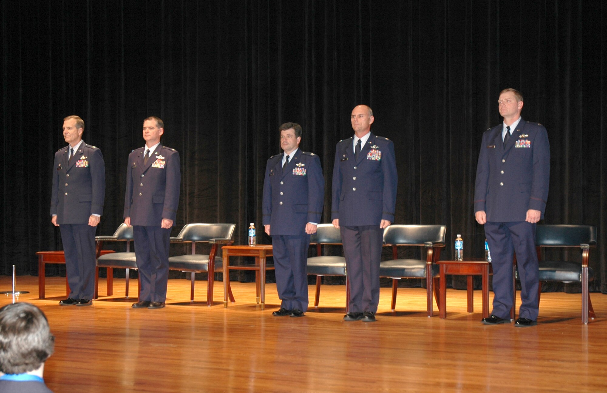 The 315th Airlift Wing held its first ever triple change of command on Jan. 12, 2008.  The change in leadership happened for the 315th Operations Group, 300th Airlift Squadron and 315th Operations Support Squadron.  Lt. Col. Ben Vorhees took command of OSS from Lt. Col. Rick Kemble, Lt. Col. Kemble took command of the 300th AS from Col. Bill Edwards and Col. Edwards took command of the OG from Col. Jay Pittman.  Pictured from left to right during the ceremony: Col. Tim Wrighton, Col. Jay Pittman, Col. Bill Edwards, Lt. Col. Rick Kemble and Lt. Col. Ben Vorhees.  (Photo by Master Sgt. Tom Crawford, USAFR)   