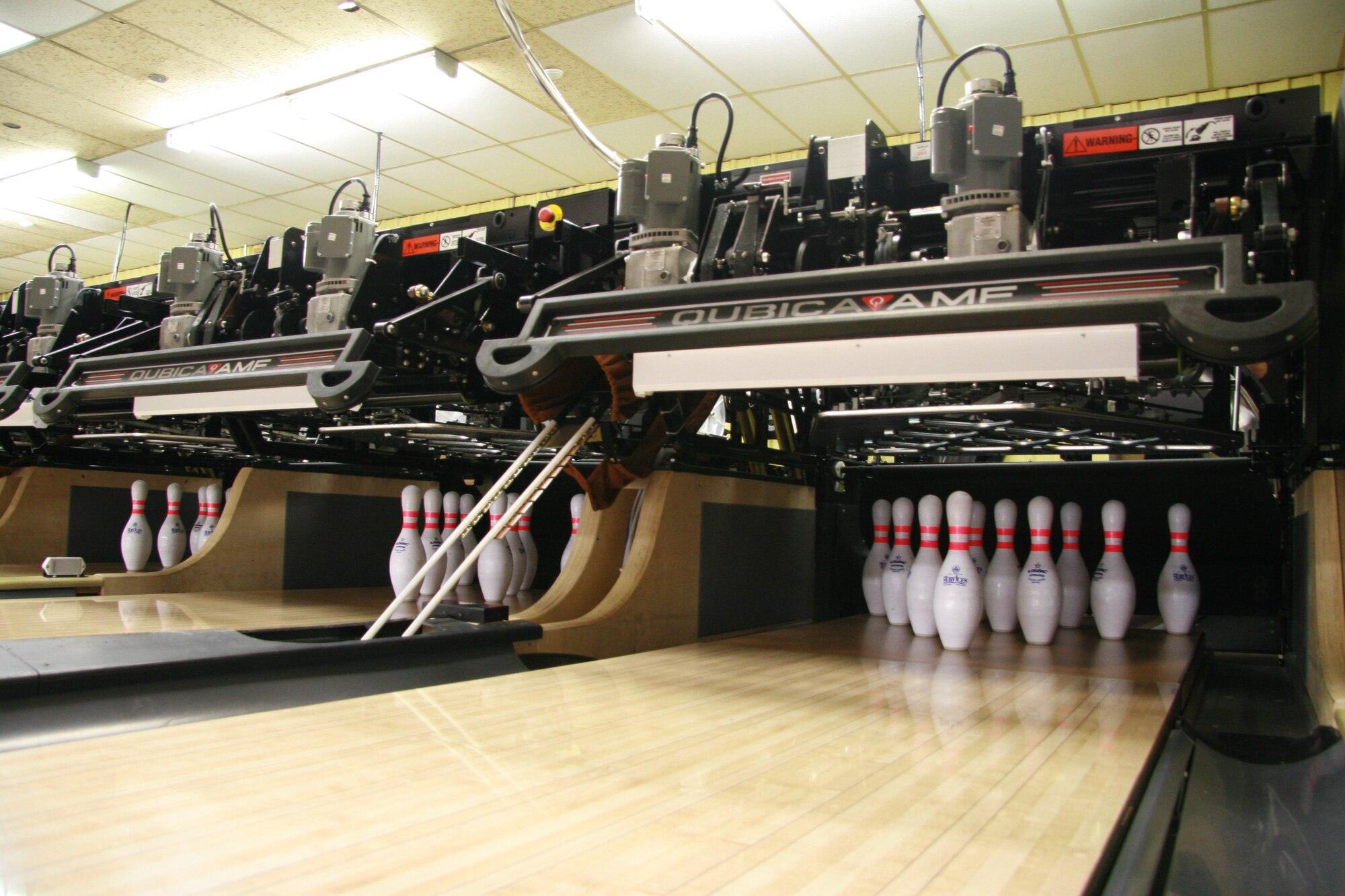 The Thede Bowling Center installed new pin machines, which opened officially Dec. 17. The previous pin machines were so old that the bowling center had to send to Eastern Europe for replacement parts. (U.S. Air Force photo by Julie Manuel)