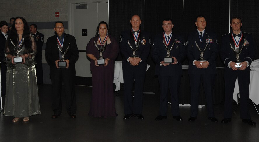 MOODY AIR FORCE BASE, Ga. -- The winners of the ten annual award categories pose for a photo after receiving their trophies Jan 12 here. More than 50 Airmen and civilians were nominated for their personal accomplishments and exemplary demonstration of the Air Force's core values. (U.S. Air Force photo by Airman 1st Class Gina Chiaverotti)
