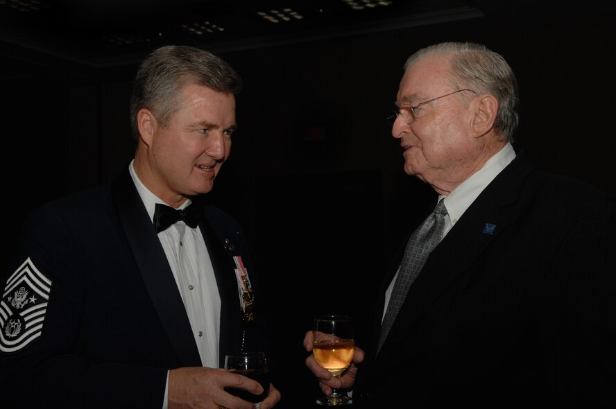 MOODY AIR FORCE BASE, Ga. -- Retired Chief Master Sgt. of the Air Force Gerald Murray and Parker Greene, chairman of the Moody Support Committee share a laugh before the start of the Moody Air Force Base Annual Awards Jan. 12. Murray, the 14th chief master sergeant of the Air Force, was the guest speaker for the night. (U.S. Air Force photo by Gina Chiaverotti)