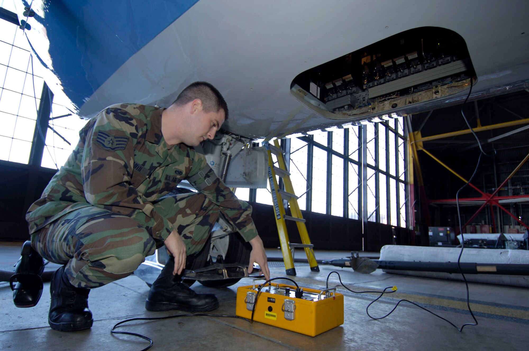 Staff Sgt. Stephen Smith, a communication and navigation systems craftsman, conducts a transponder test on a C-9C Skytrain aircraft in hangar one, Scott AFB, Ill.  Assigned to the 932nd Airlift Wing, the C-9C, along with the C-40C, provide safe, comfortable, and reliable transportation for dignitaries.
U.S. Air Force photo/Tech. Sgt. Tony R. Tolley 