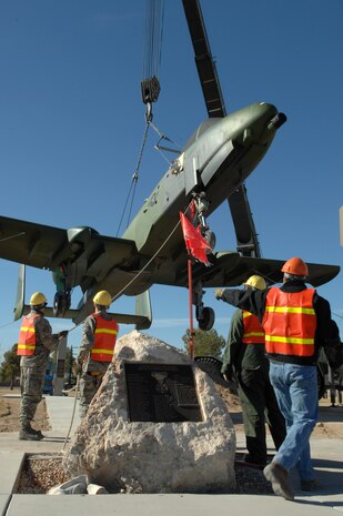 A-10 “Warthog” crew chiefs and maintenance personnel assigned to the 57th Equipment Maintenance and 99th Civil Engineer squadrons, prepare to position the aircraft on a static display at Freedom Park here, Jan. 14. Previously a static display at Naval Air Station New Orleans with the 706th Fighter Squadron, work to bring the A-10 to Nellis began more than a year ago. Airmen from the 57th EMS refurbished the aircraft at the behest of 99th Air Base Wing installation commander, Col. Michael Bartley. The aircraft is on loan from the National Museum of the United States Air Force. (U.S. Air Force photo by Senior Airman Nadine Y. Barclay)