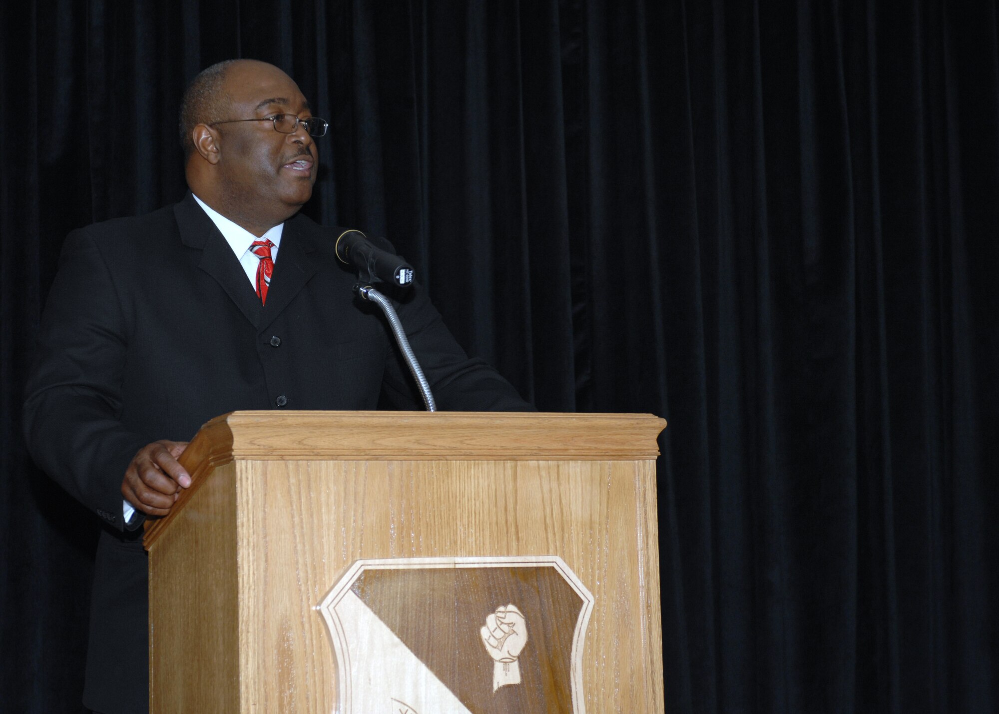CANNON AIR FORCE BASE, N.M. - Rev. Joe Callahan Jr. speaks at the Martin Luther King Jr. memorial breakfast Jan. 15. The breakfast, hosted by the Cultural Observance Committee, was held at the Landing in honor of Dr. King's birthday Jan. 17. (U.S. Air Force photo by Airman 1st Class James Bell)