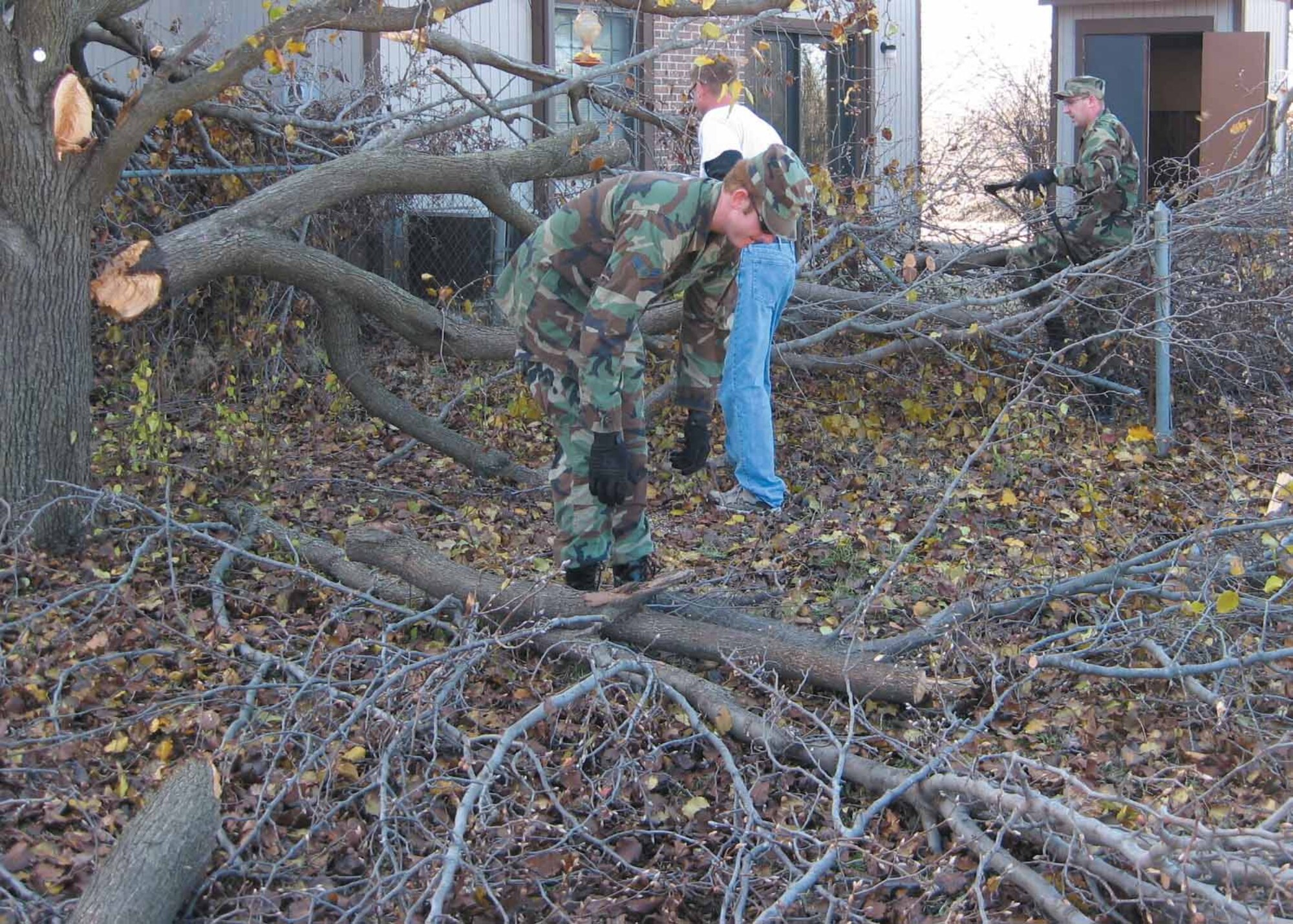 Air Force Sergeants Association Thunderbird Chapter 985, President Bryan Thompson sent out a call to local AFSA members to assist Tinker Air Force Base with Ice Storm 2007 clean-up. Sixty volunteers answered the call and helped clean up debris in the family housing area.  (Courtesy photo)