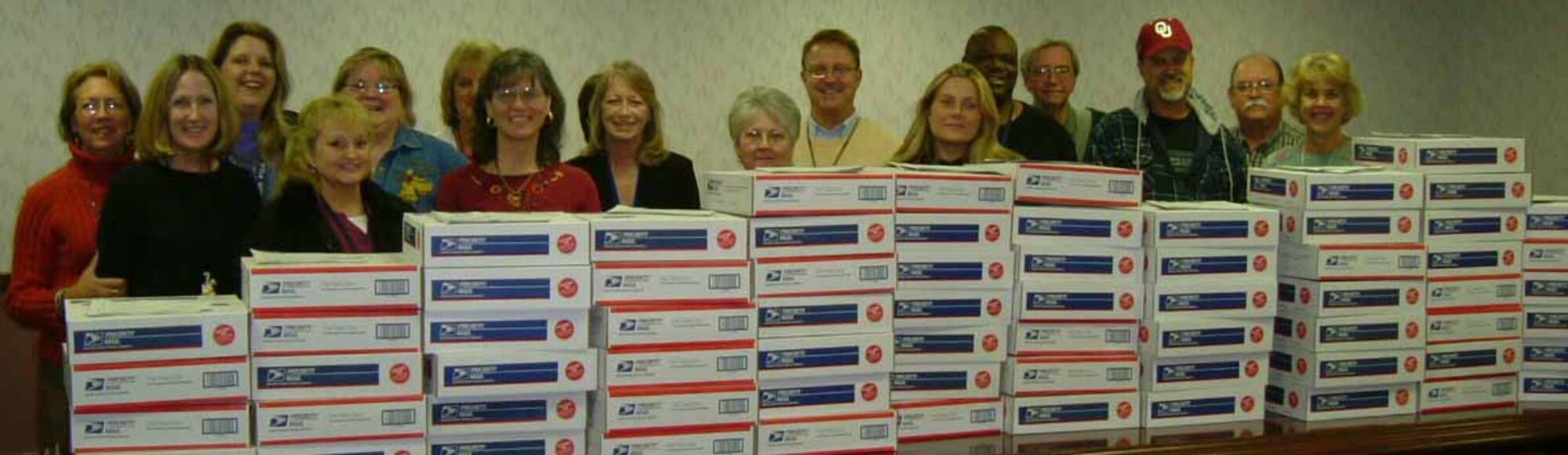 IT Volunteers packed 75 boxes to be sent to servicemen and women.  (Photo by Kathy Schults) 