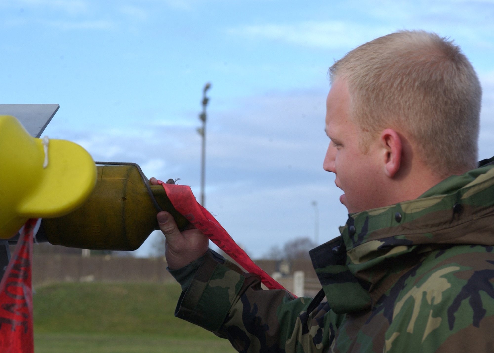 Airman 1st Class Tate Fackrell, 48th Munitions Squadron munitions systems specialist, inspects a load of missiles before sending them to the flightline on RAF Lakenheath, England Jan. 9. Three or four loads a day are inspected for safety and sent out to the flightline. After the missiles arrive on the flightline, armament loaders load the weapons onto the aircraft. (U.S. Air Force photo by Airman 1st Class Torri Ingalsbe)