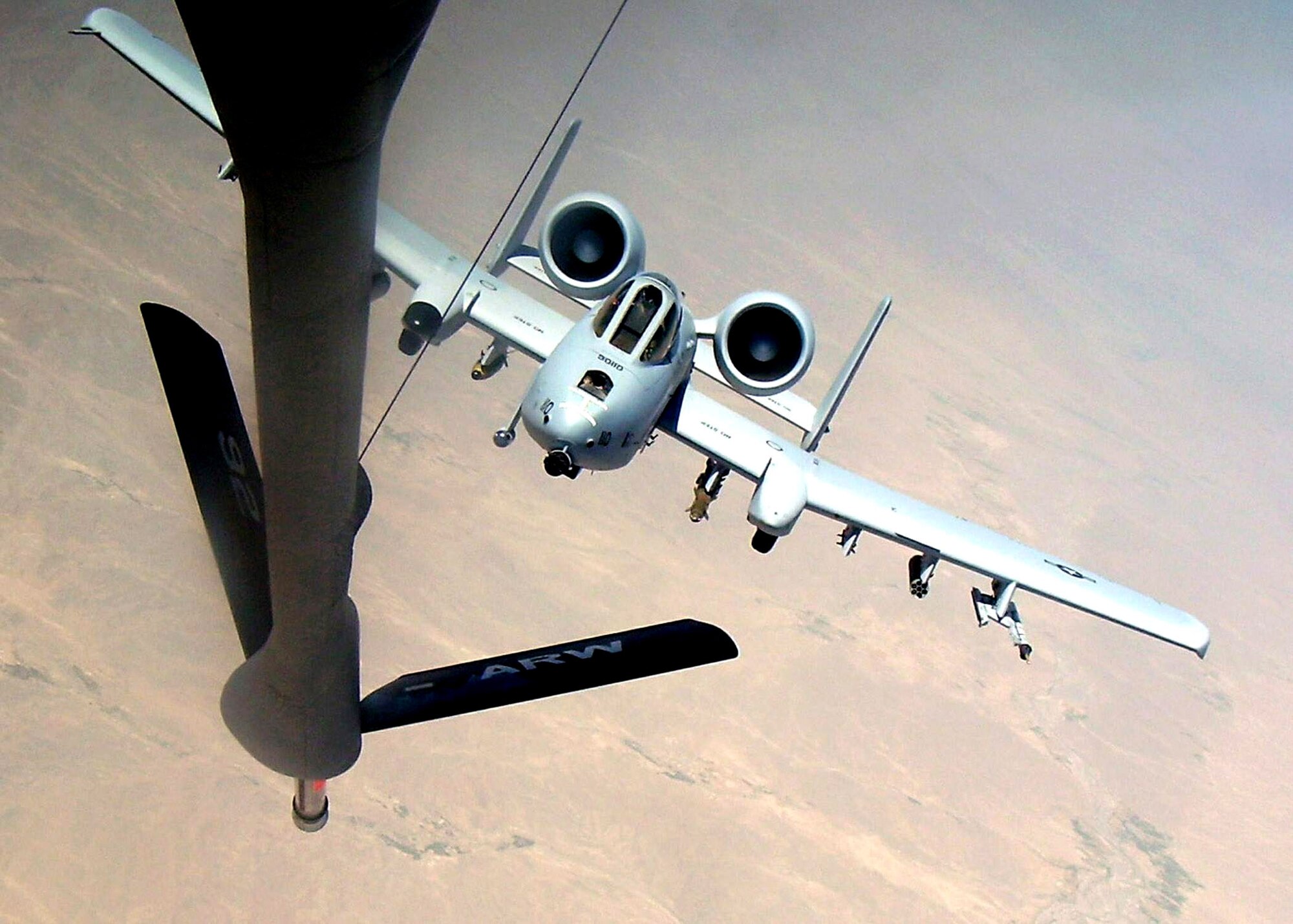 An A-10 Thunderbolt II moves into position behind a KC-135 Stratotanker on a combat mission over Afghanistan. The A-10 is deployed from the 442nd Fighter Wing, an Air Force Reserve unit based at Whiteman Air Force Base, Mo., to Bagram Air Base, Afghanistan, as part of Operation Enduring Freedom. (U.S. Air Force photo/Lt. Col. Marcel Dionne) 
