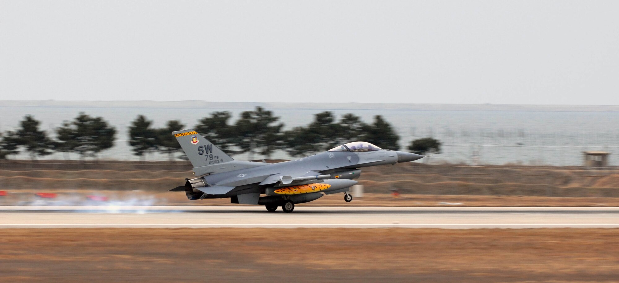 KUNSAN AIR BASE, South Korea -- An F-16 from the 79th Fighter Squadron, Shaw Air Force Base, S.C. arrives as part of a Theater Security Package (TSP) here Jan. 15. The unit's more than 300 Airmen and aircraft are here as the squadron's Air and Space Expeditionary Force deployment to help maintain peace and stability in the Pacific region as they fully integrate into the mission of the 8th Fighter Wing.  (U.S. Air Force photo/Senior Airman Steven R. Doty)