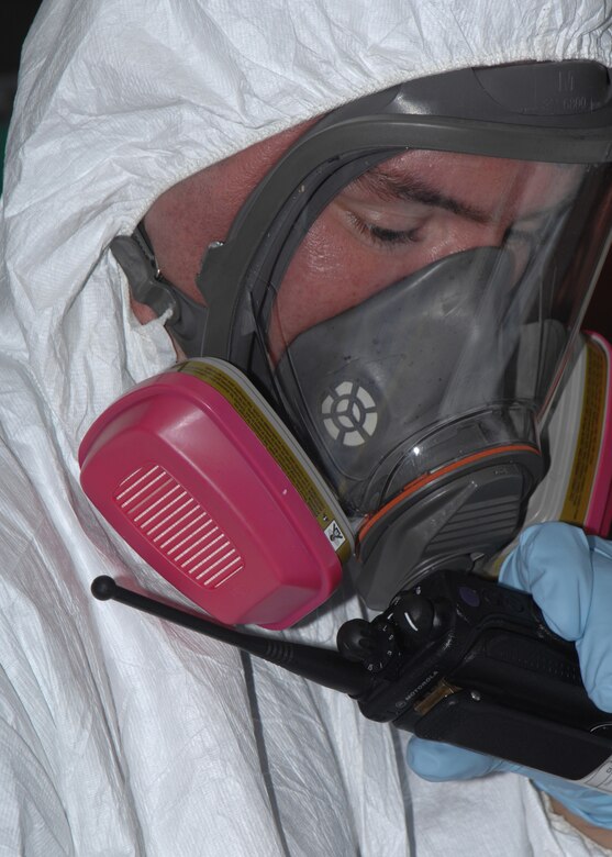 Staff Sgt. William Mitchell, 36th Medical Group bioenvironmental technician, reports biological findings during a Disease Containment Exercise Jan 15. The purpose of the exercise is to identify procedures for response and recovery in the event of a disease outbreak, either from natural causes or the result of a terrorist incident or enemy attack. (U.S. Air Force photo/Senior Airman Sonya Padilla)