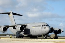 A C-17 Globemaster III sits on the flightline at Wake Island Jan. 12, 2008. The C-17, from the 15th Airlift Wing, Hickam Air Force Base, Hawaii, brought members of Pacific Air Forces headquarters to conduct a site survey of the island. (U.S. Air Force photo/TSgt. Shane A. Cuomo)  