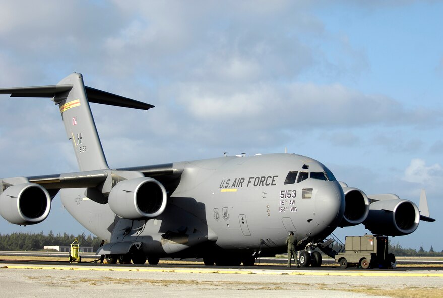 A C-17 Globemaster III sits on the flightline at Wake Island Jan. 12, 2008. The C-17, from the 15th Airlift Wing, Hickam Air Force Base, Hawaii, brought members of Pacific Air Forces headquarters to conduct a site survey of the island. (U.S. Air Force photo/TSgt. Shane A. Cuomo)  