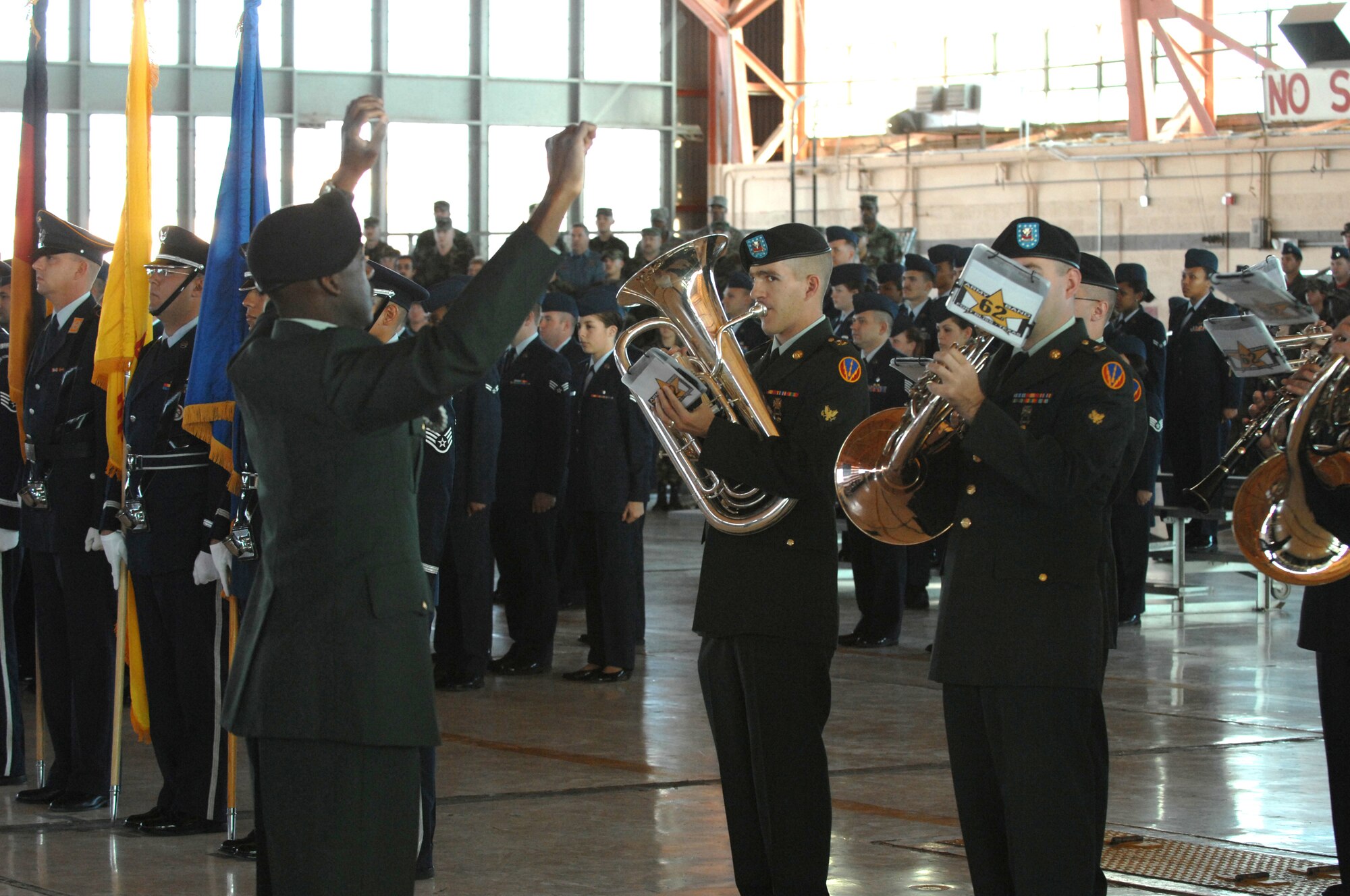 The Fort Bliss Band performs the Air Force Song, ending the 49th Fighter Wing change of command ceremony Jan. 11, 2008, at Holloman Air Force Base, N.M. The ceremony was attended by members of Team Holloman and visitors from Alamogordo, White Sands and Las Cruces, N.M., and Fort Bliss, Texas. (U.S. Air Force photo/Senior Airman Anthony Nelson Jr) 