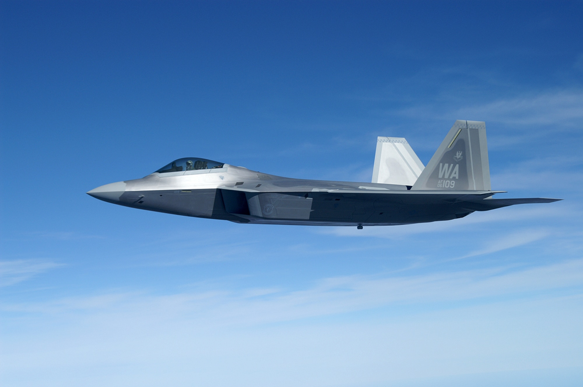 Maj. Micah Fesler, a 433rd Weapons Squadron pilot, flies an F-22A “Raptor” from the Lockheed-Martin factory in Georgia to Nellis AFB, Jan. 9. This Raptor is the first to be delivered to the 57th Wing from Lockheed-Martin, and is scheduled to be used by the U.S. Air Force Weapons School for training of PhD-level instructor pilots. (U.S. Air Force photo by Tech. Sgt. Phil Landram)