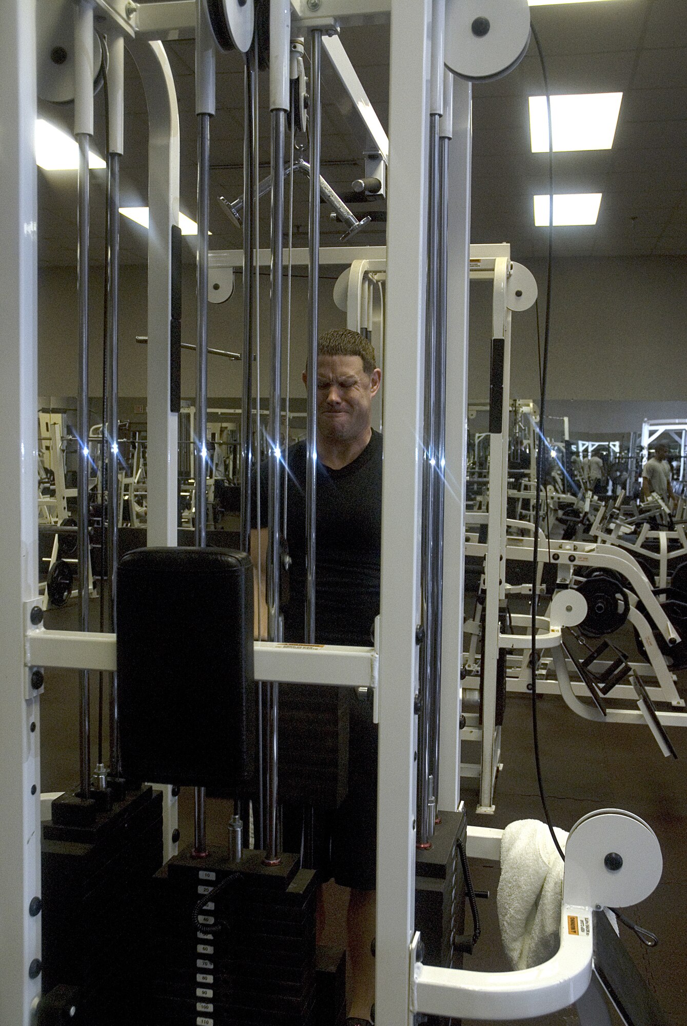 Tech. Sgt. Shawn McKeen, 437th Service Squadron Fitness and Sport Center NCOIC, lift weights in the free weight room Jan 15.  The center has more than 40 pieces of equipment to help Team Charleston Airmen stay fit.  (U.S. Air Force photo by Staff. Sgt. Jennifer Arredondo)