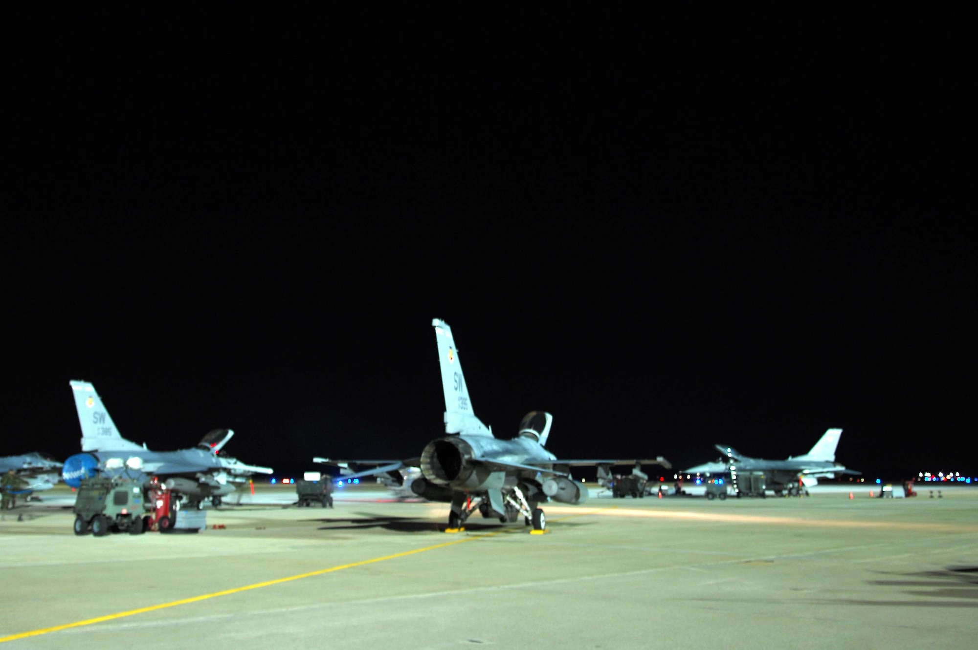 SHAW AIR FORCE BASE, S.C. -- Multiple F-16s from the 55th Fighter Squadron prepare for night training Jan. 15. Night flying helps prepare pilots and ground crew for the difficult task of real combat operations. (U.S. Air Force photo/Airman 1st Class William Coleman)