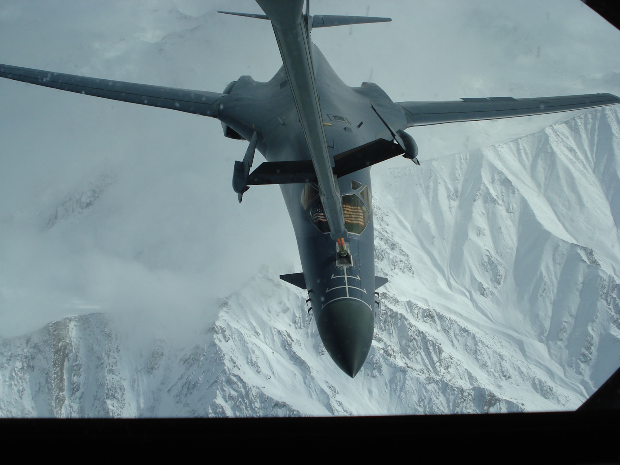 A deployed Dyess B-1 is refueled by a KC-135 Jan. 15 in Southwest Asia. The 9th Bomb Squadron is scheduled to return home shortly. (U.S. Air Force photo)