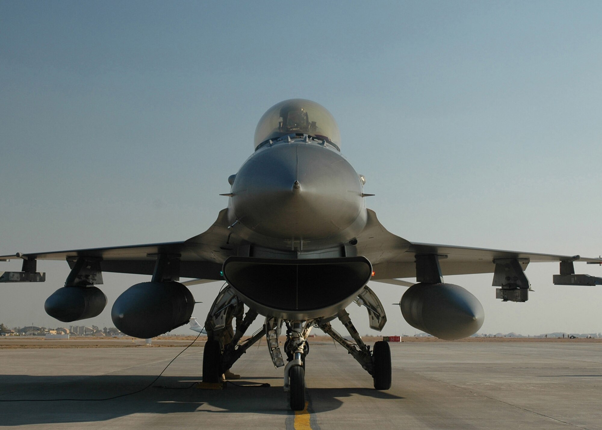 An Air Force F-16 Fighting Falcon at Balad Air Base, Iraq, waits for its next mission. (U.S. Air Force photo)