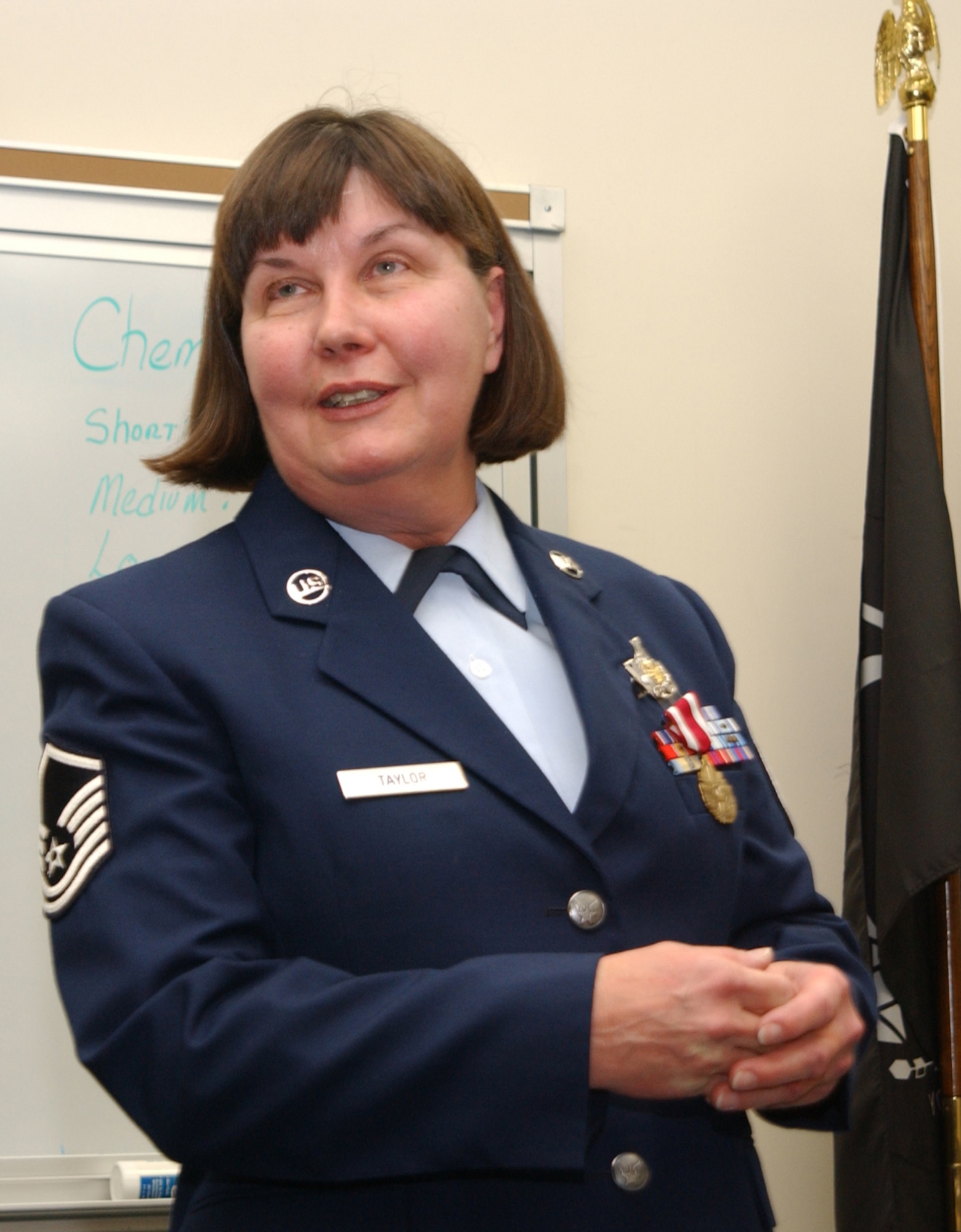 YOUNGSTOWN AIR RESERVE STATION, Ohio — MSgt. Frances Taylor addresses the audience at her retirement ceremony in December 2007 after nearly 33 years of military service as a firefighter. U.S. Air Force photo/Tech. Sgt. Richard Lisum