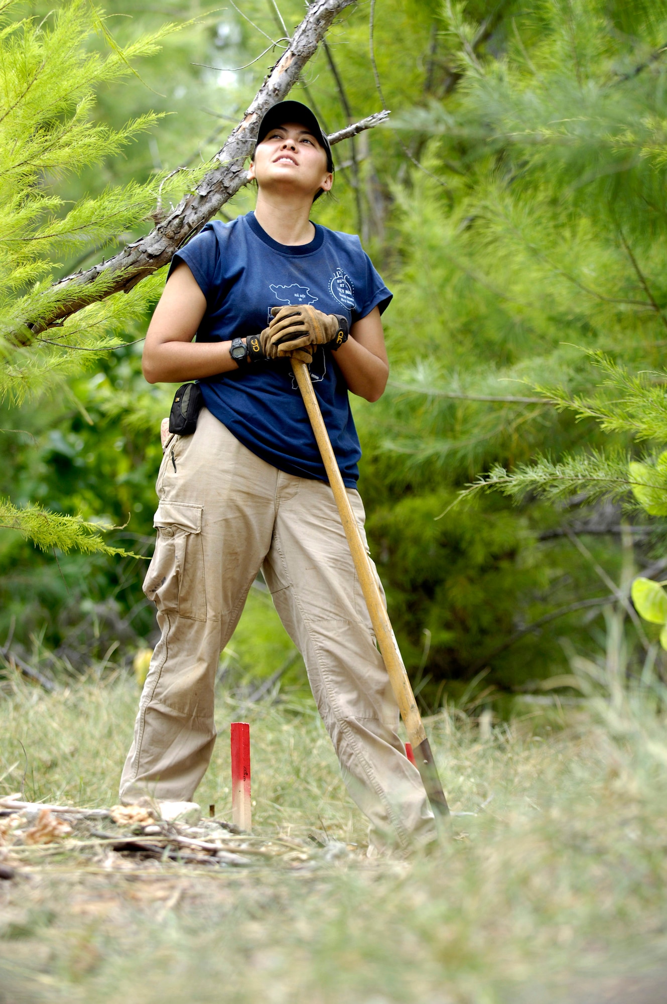 Denise To takes a break from excavating a dig site Jan. 12 on Wake Island. Ms. To, a forensic anthropologist, was sent to do a site survey after Wake Island officials notified the Joint POW/MIA Accounting Command of bones located on the island. JPAC officials are charged with achieving the fullest possible accounting of all Americans missing as a result of past conflicts. (U.S. Air Force photo/Tech. Sgt. Shane A. Cuomo) 