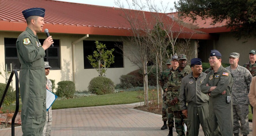 Col. GI Tuck, 60th Air Mobility Win acting commander, speaks before the Martin Luther King Remembrance Walk Jan. 14. The walk began at the 60th AMW headquarters and ended at the base theater. (U.S. Air Force photo/Tech. Sgt. Matthew McGovern)

