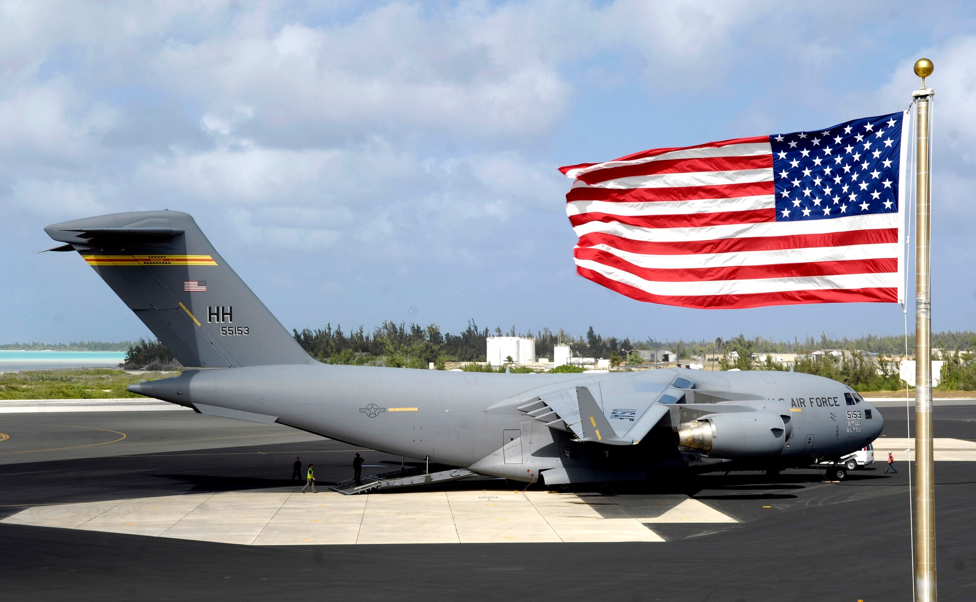 A C-17 Globemaster III sits on the flightline Jan. 12 at Wake Island. The C-17, from the 15th Airlift Wing from Hickam Air Force Base, Hawaii, brought members of Pacific Air Forces headquarters to conduct a site survey of the island. (U.S. Air Force photo/Tech. Sgt. Shane A. Cuomo) 
