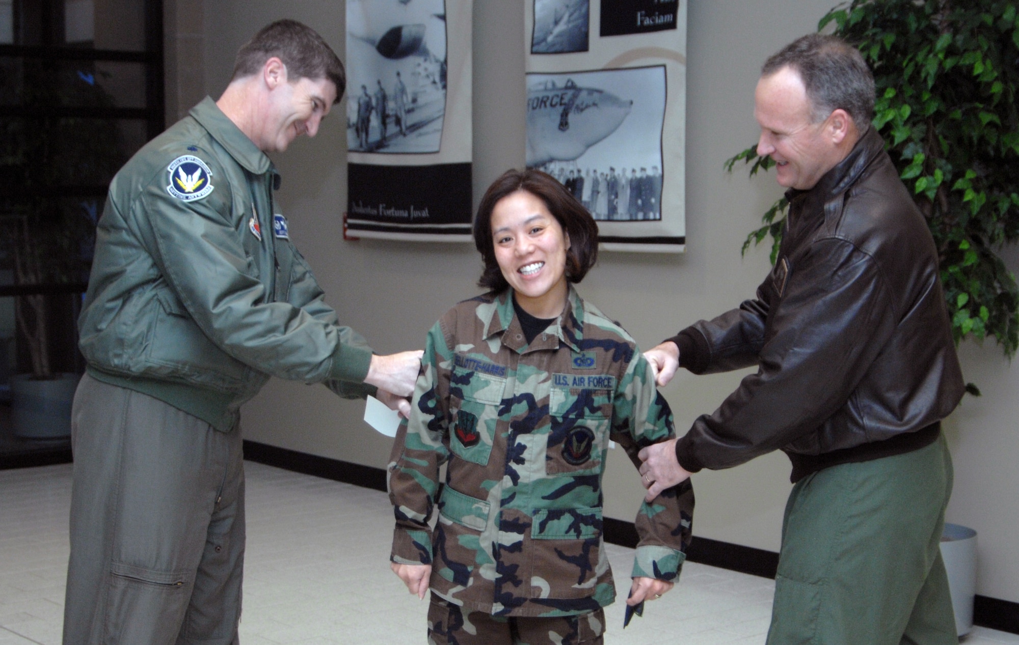 MOUNTAIN HOME AIR FORCE BASE, Idaho -- Staff Sgt. Lesa Bellotte-Harris, 366th Operations Support Squadron, receives a surprise this morning from Col. James Browne, 366th Fighter Wing commander, in the form of a STEP promotion from Staff Sergeant to Technical Sergeant, 14 Jan. STEP promotions, stripes awarded for exceptional performers, are awarded to those enlisted individuals who out perform their peers everyday. Only a handful of these promotions are dealt out each year, so receiving these stripes is an honor. (U.S. Air Force photo/ Airman 1st Class Ryan Crane)