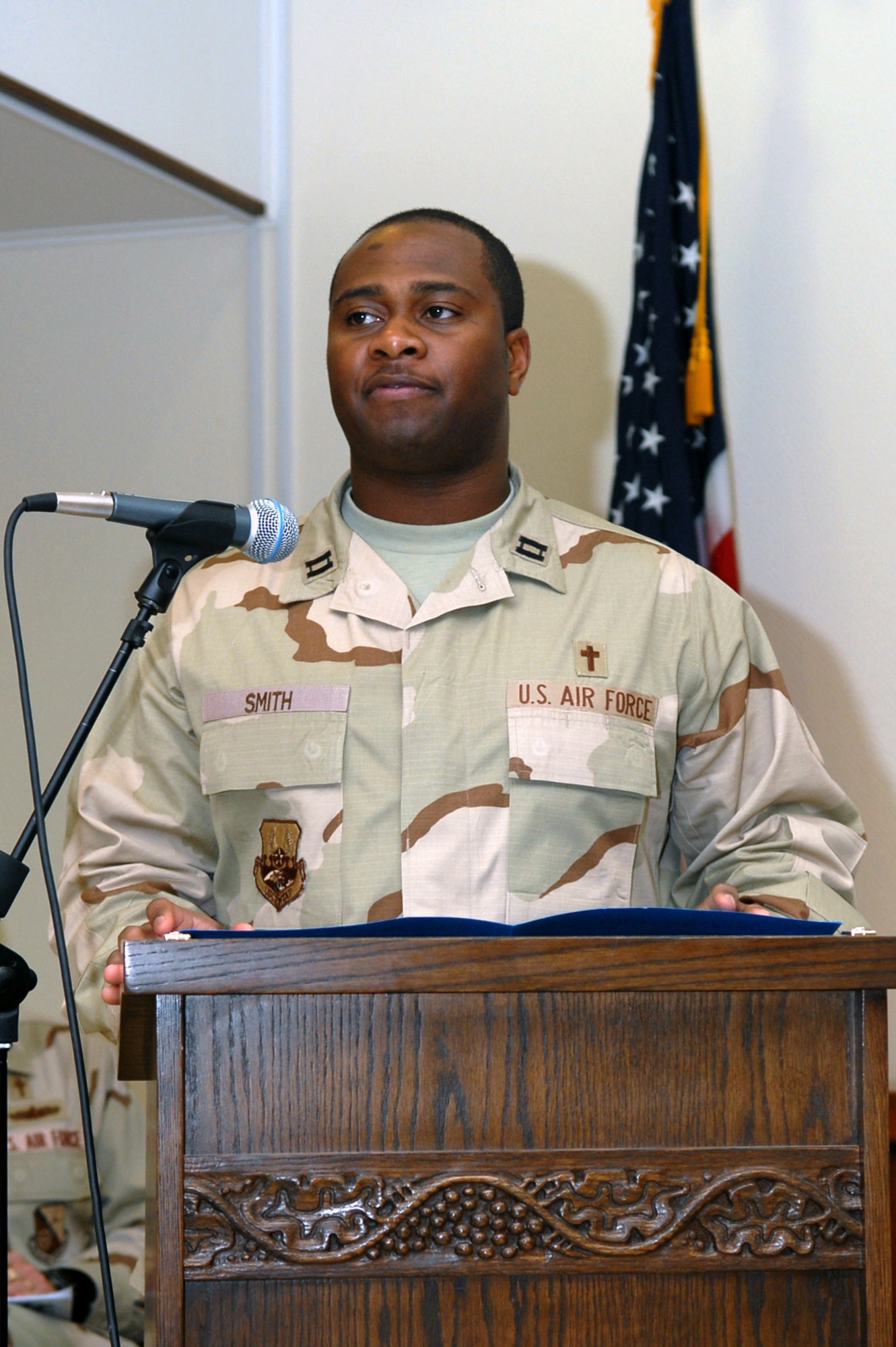 SOUTHWEST ASIA -- Chaplain (Capt.) Corwin Smith delivers a "Words of Remembrance" speech for the Victory Chapel's Martin Luther King Jr. celebration Jan. 15 at a Southwest Asia air base. The celebration included songs by the Community Choir, praise dancing and music by the US CENTAF band "Hot Brass".
(U. S. Air Force photo/Senior Airman Domonique Simmons)